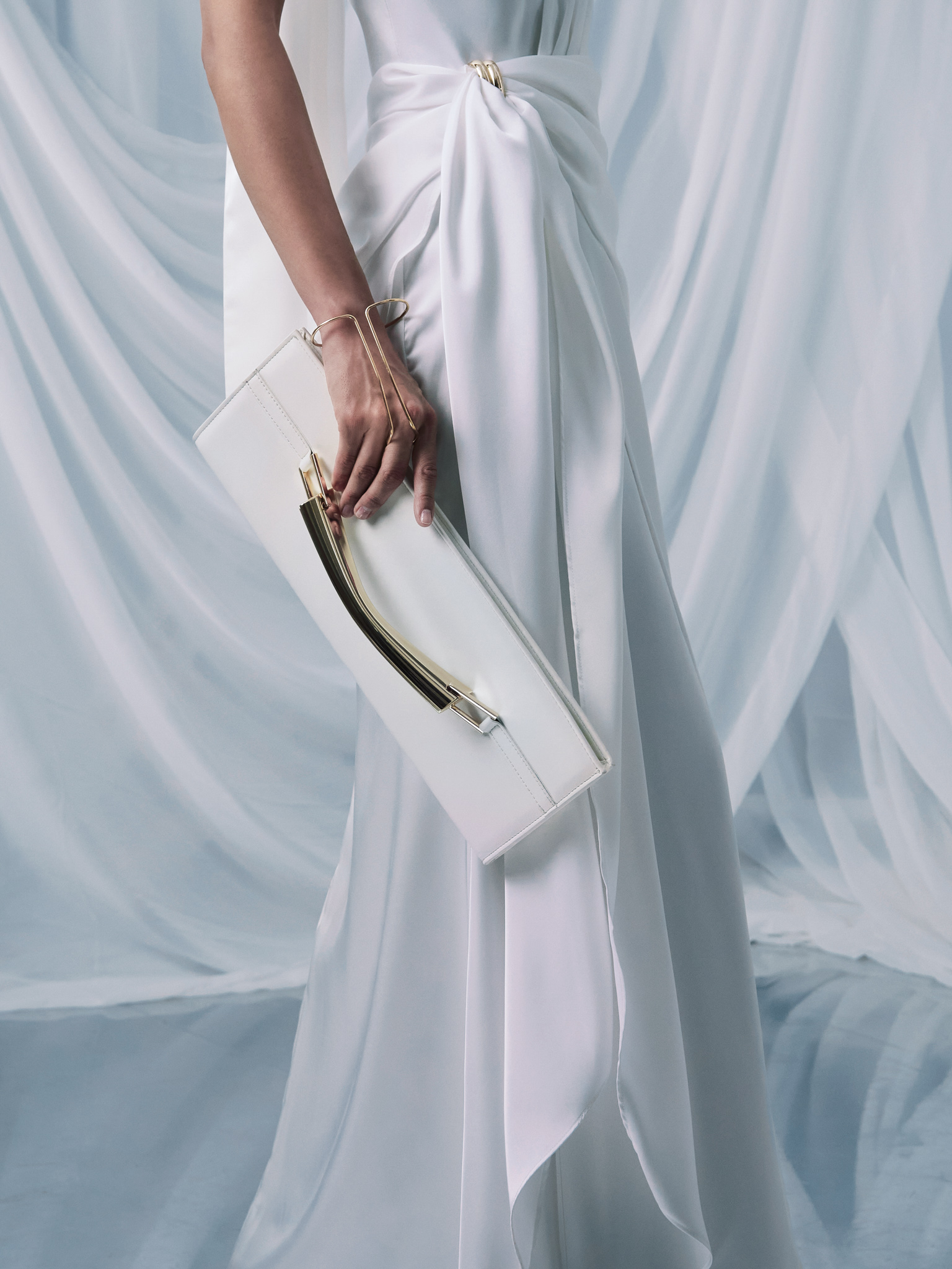 Rectangular clutch bag with metal handle