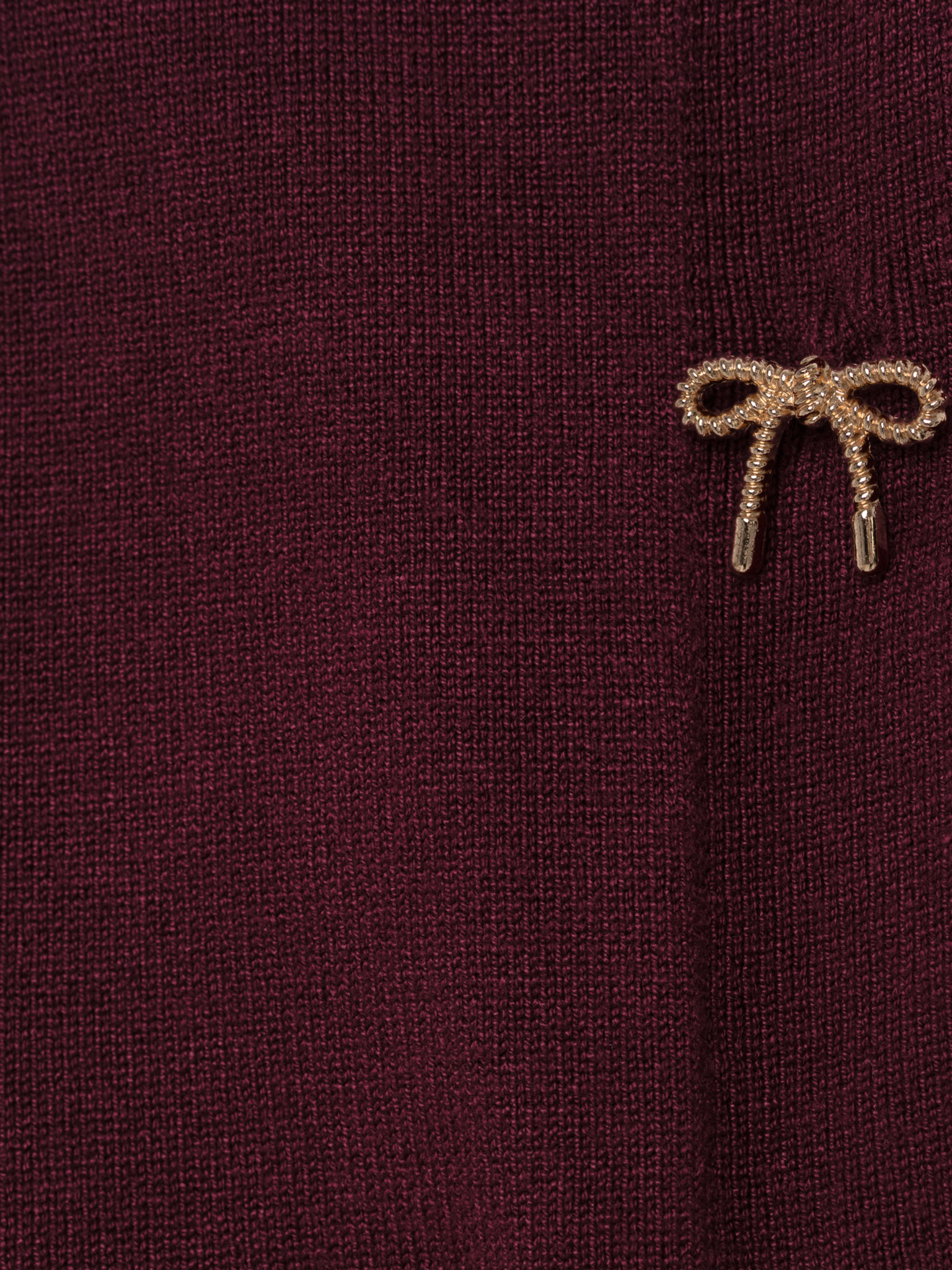 Cardigan with triangular collar and accent buttons