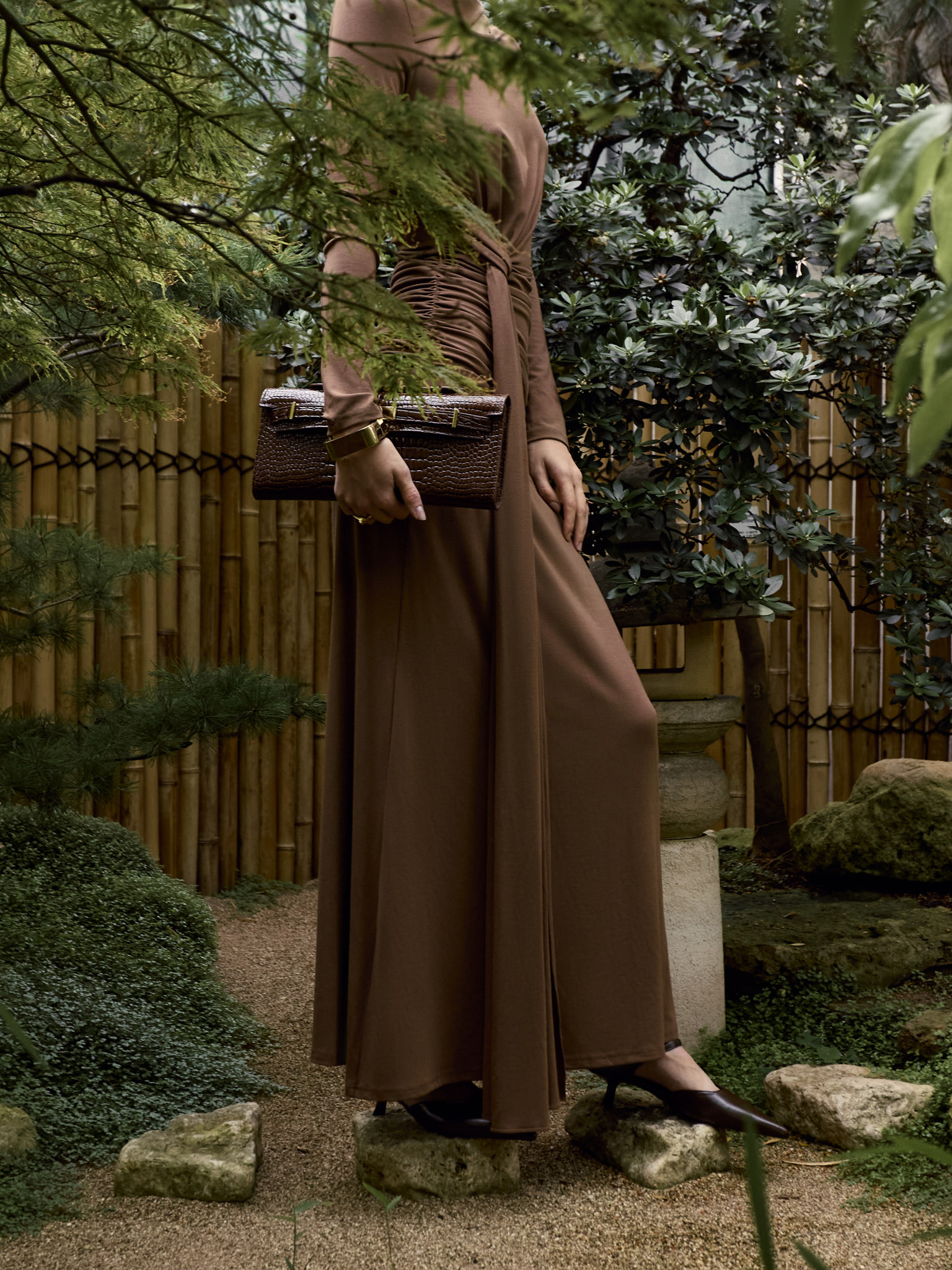 Maxi dress with metallic decoration on the shoulder