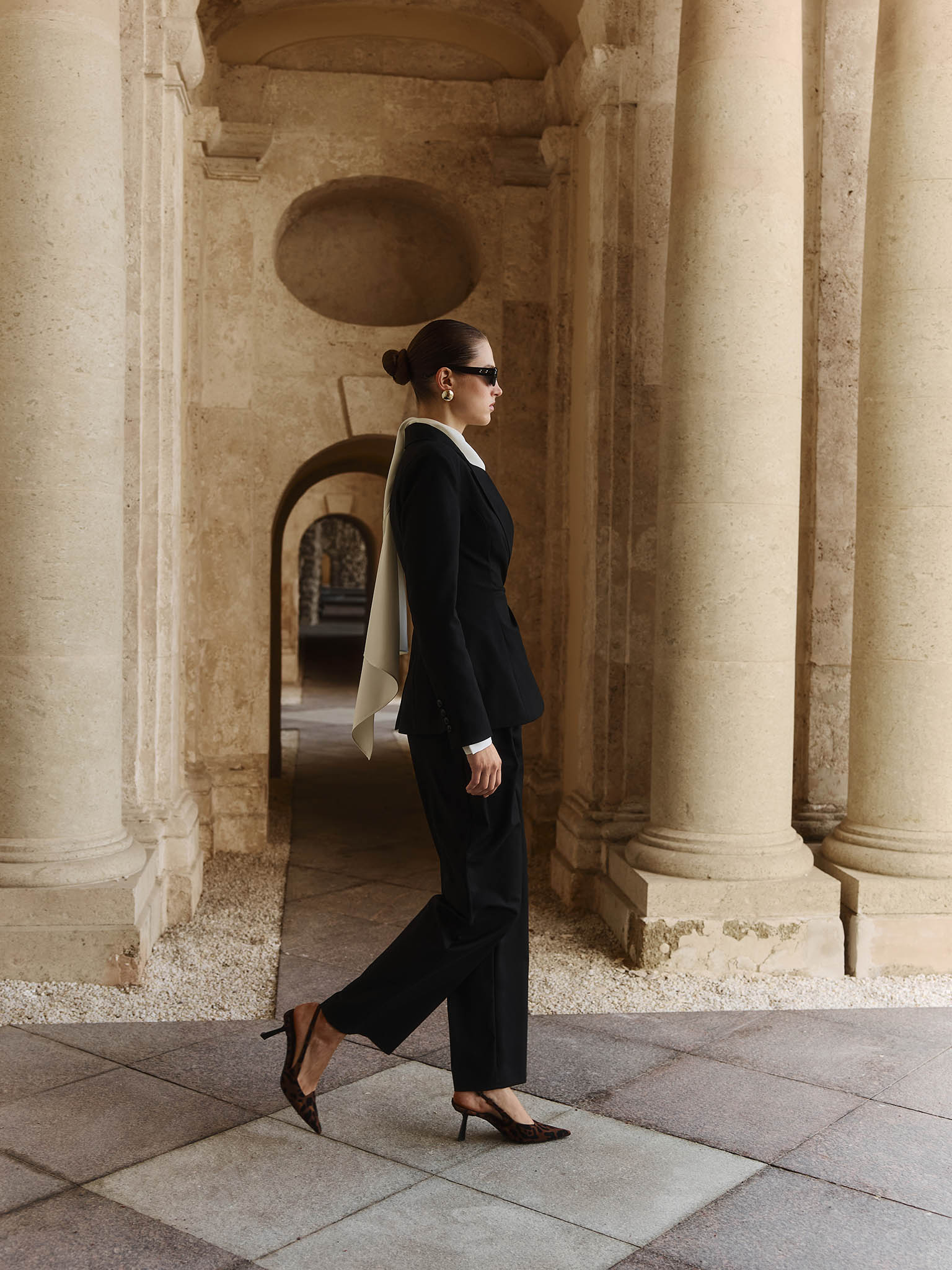 Flared jacket with asymmetrical button fastening