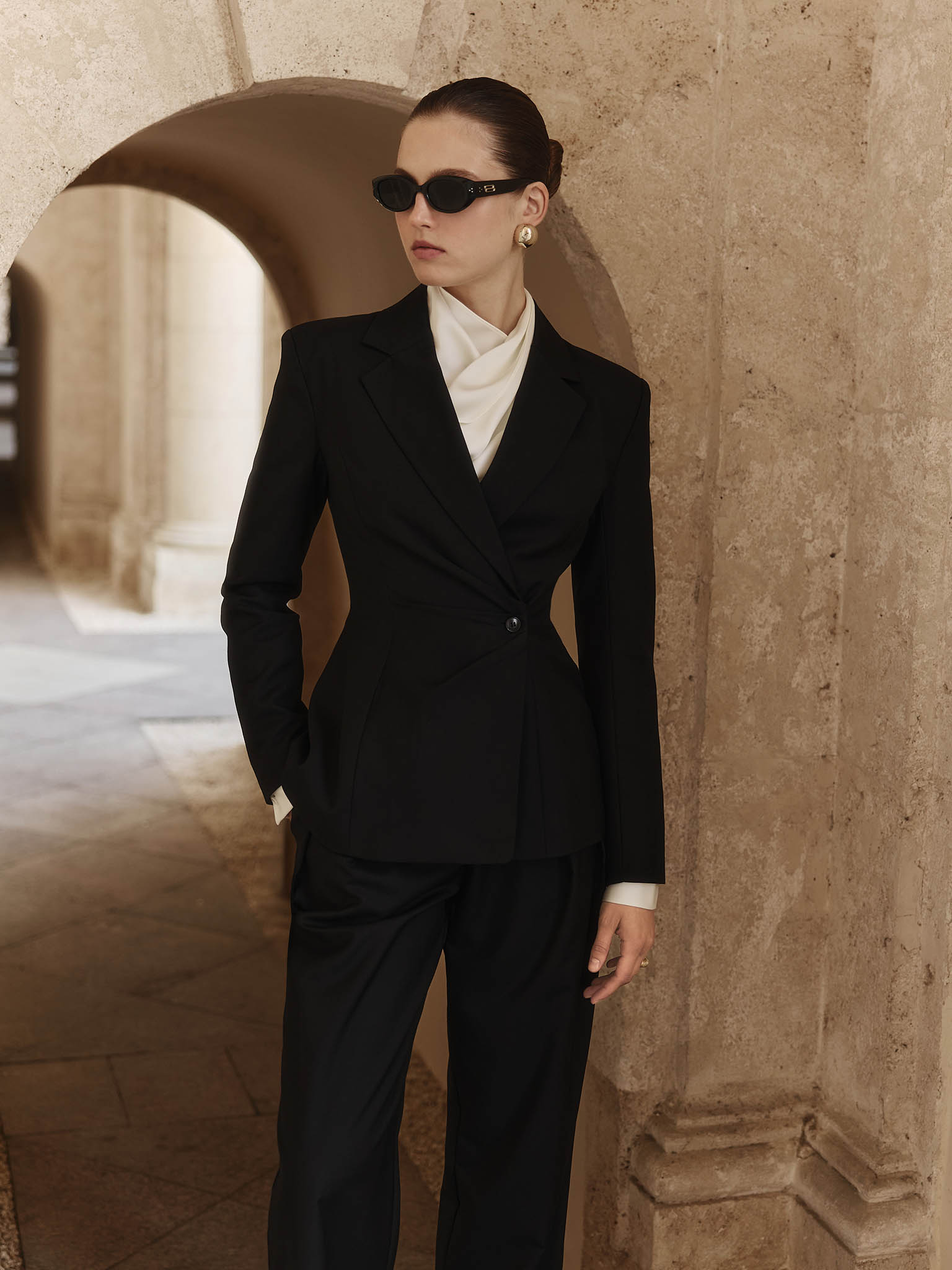 Flared jacket with asymmetrical button fastening