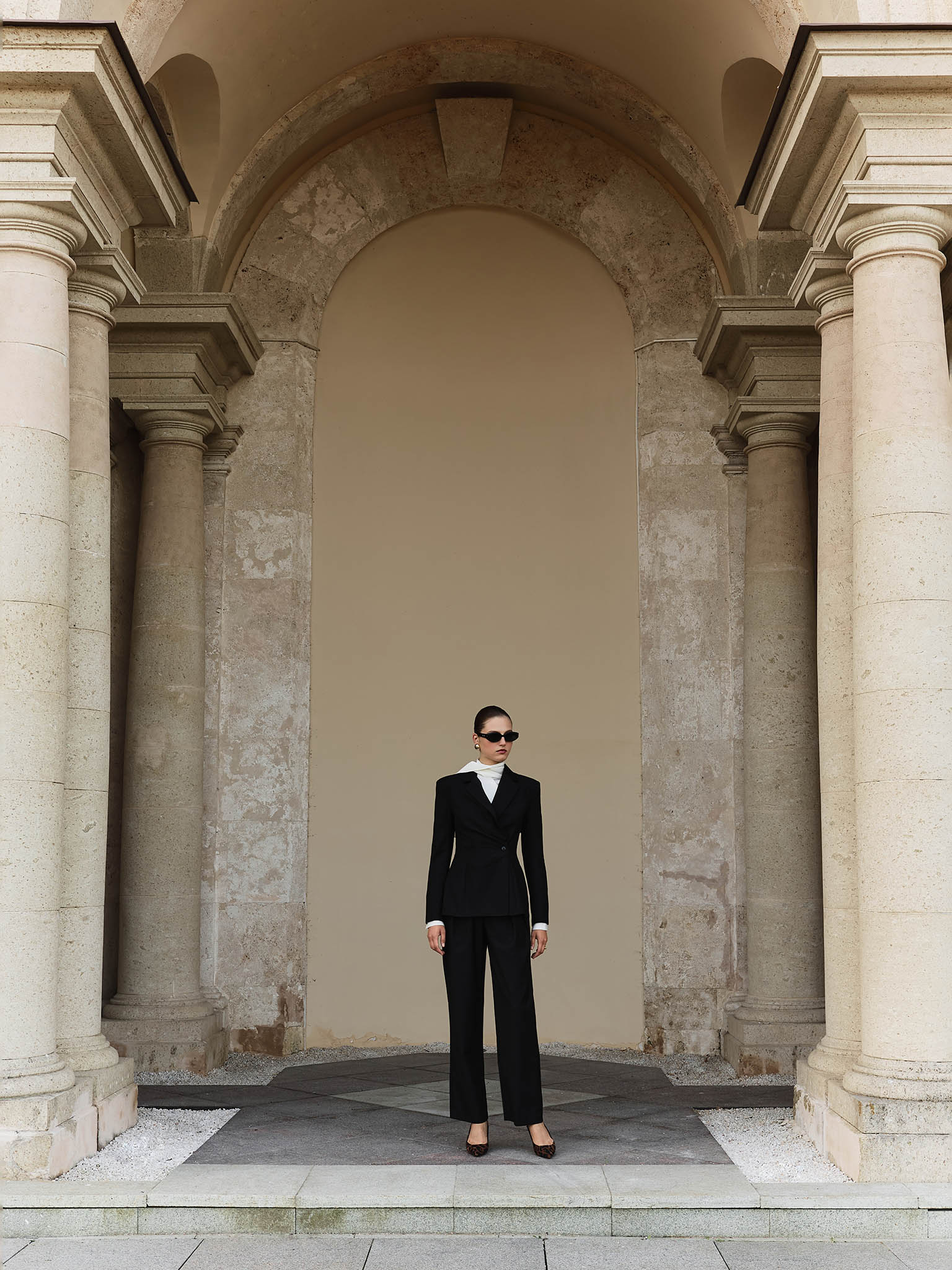 Flared jacket with asymmetrical button fastening