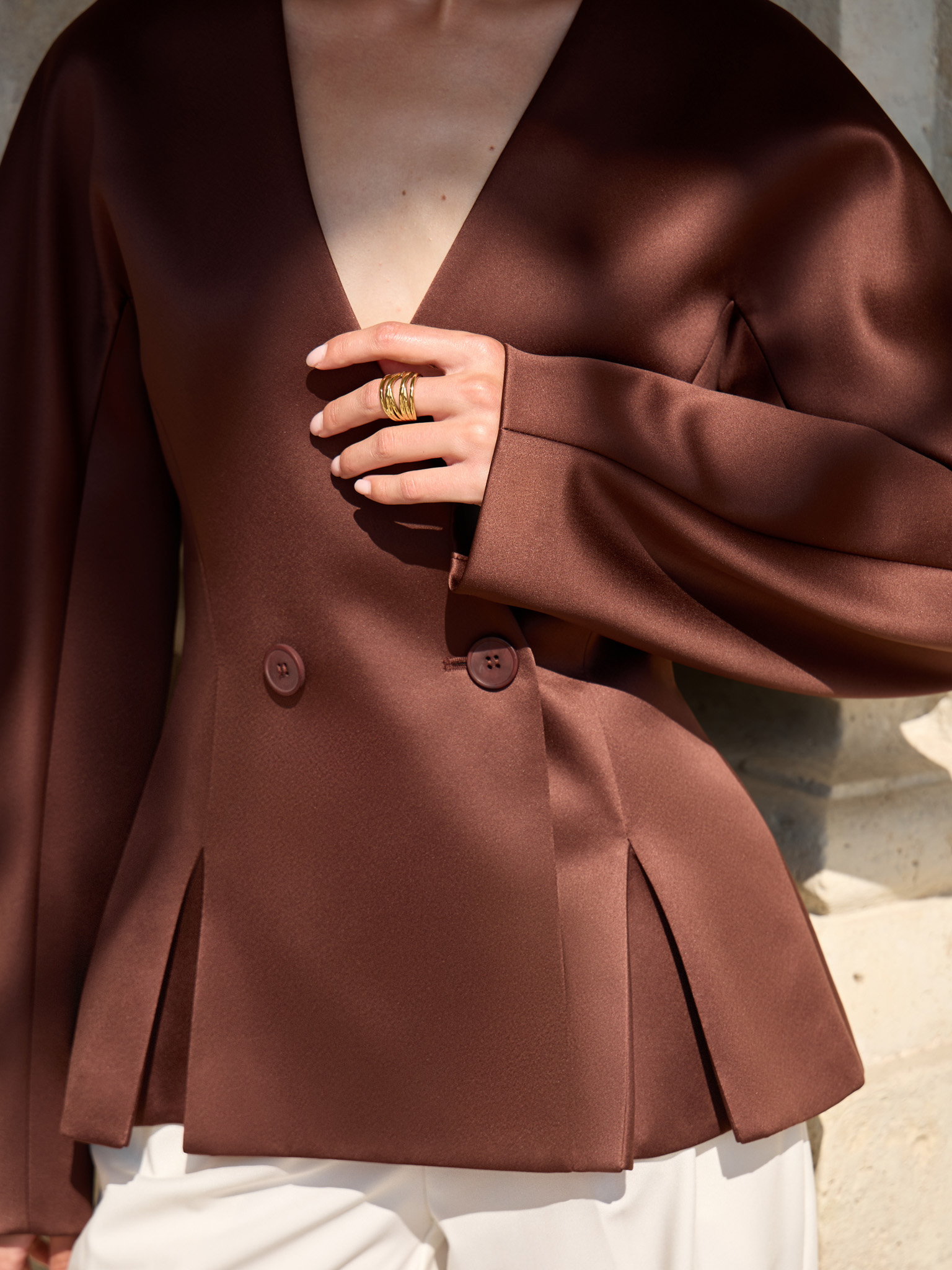 Jacket with voluminous sleeves and waist pleats