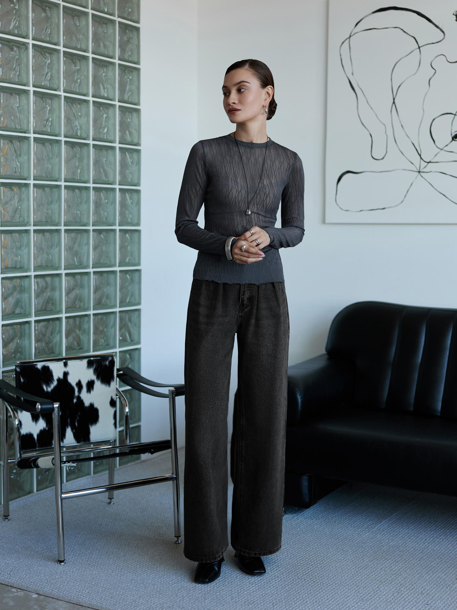 Loose jeans with waist pleats