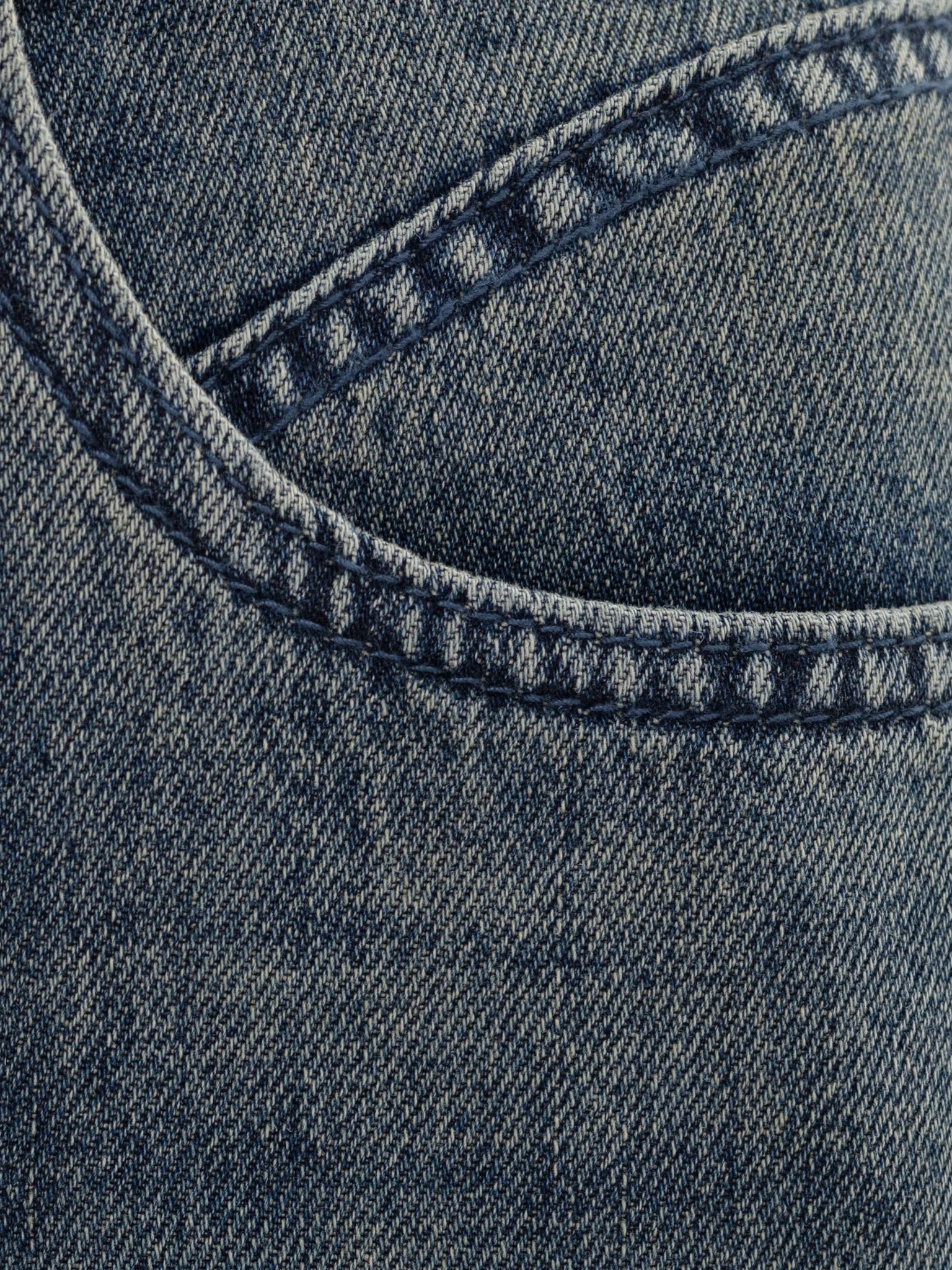 Loose distressed jeans with waist ties