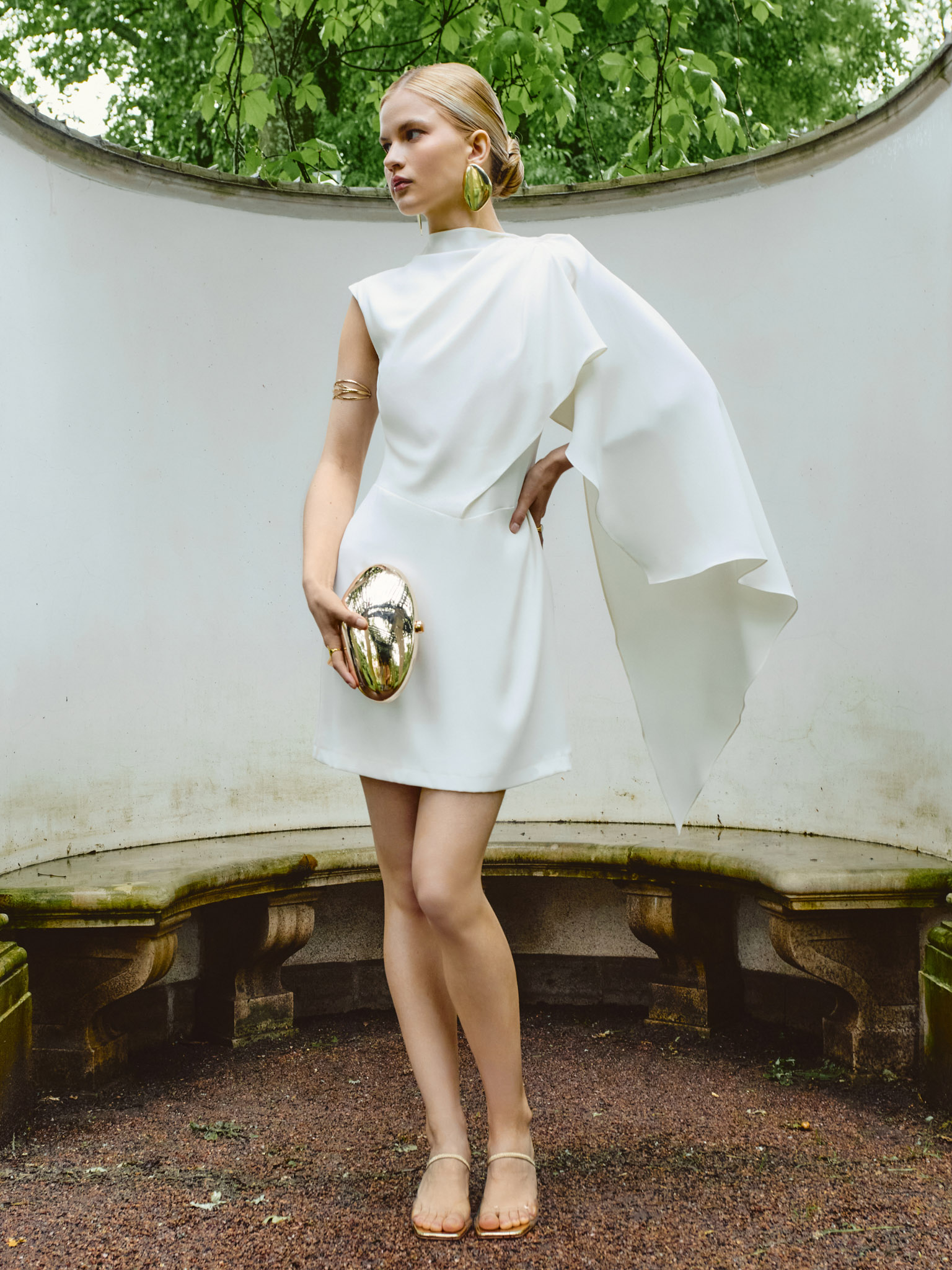 Fitted mini dress with asymmetric draping