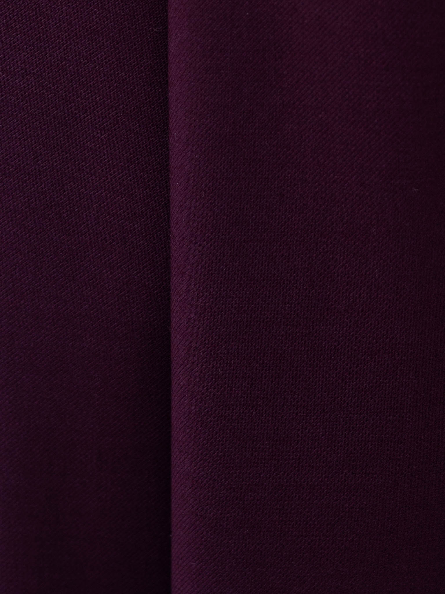Loose-fitting trousers with waist pleats