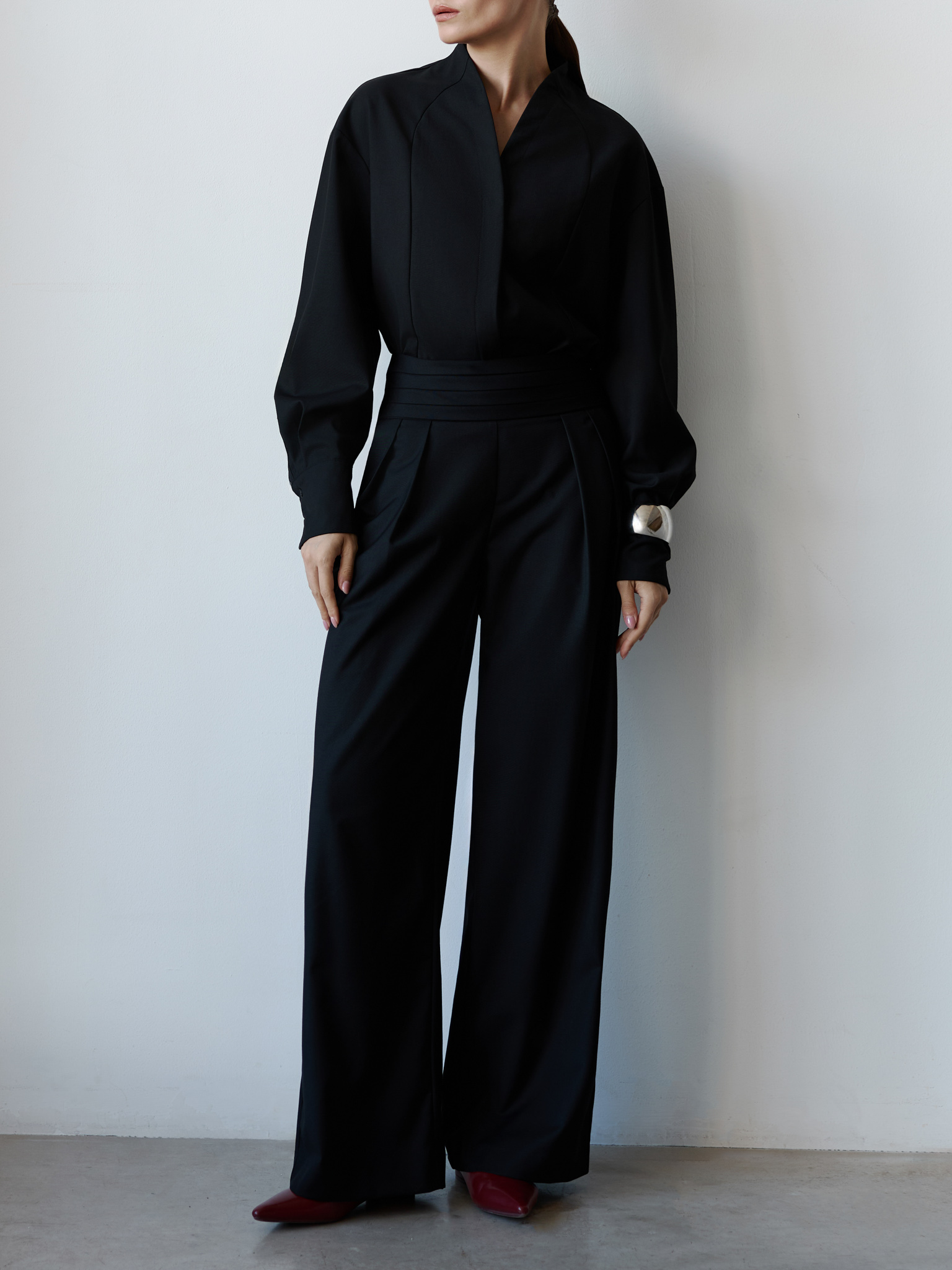 Complex cut shirt with hidden button fastening