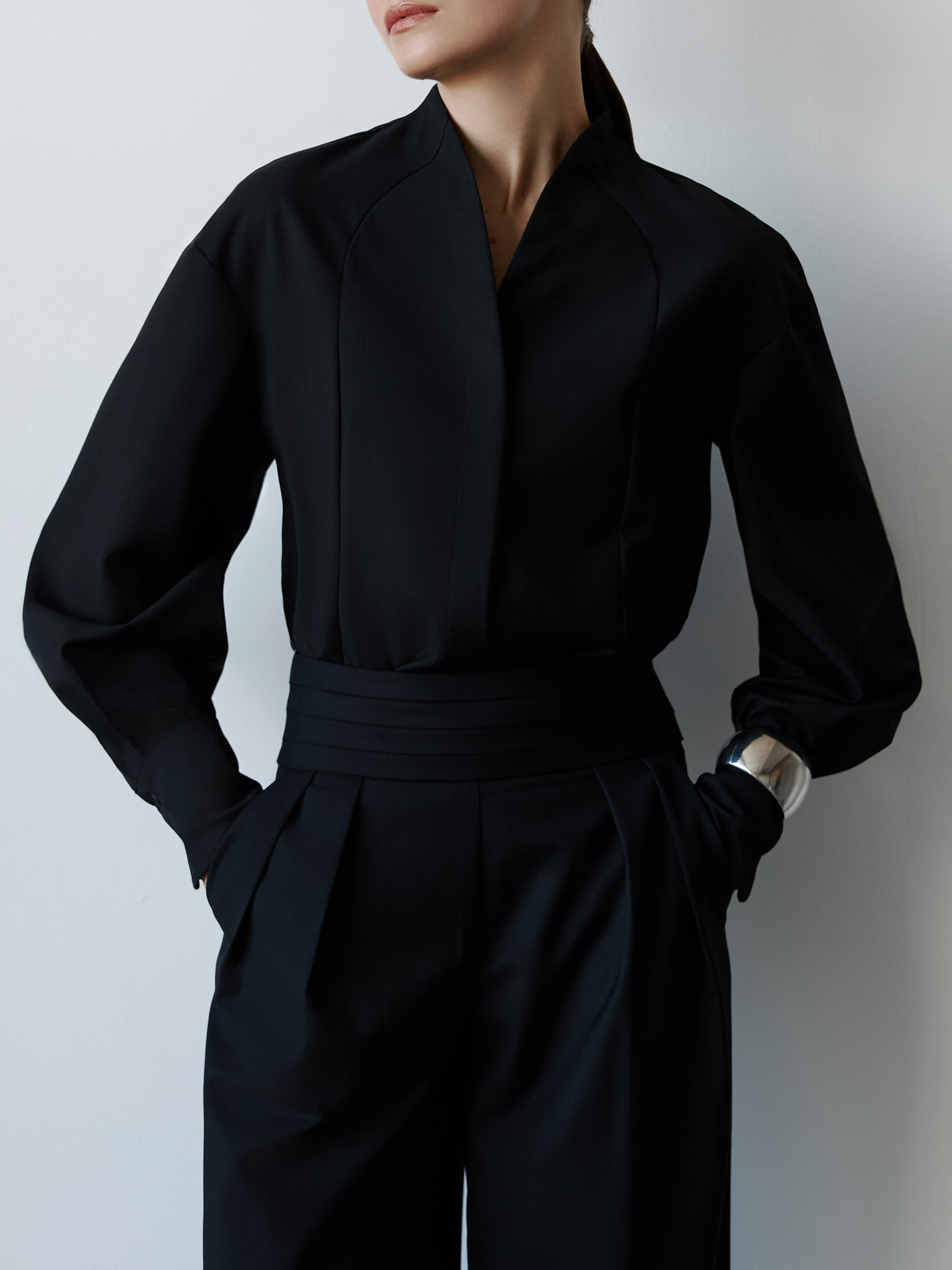 Complex cut shirt with hidden button fastening