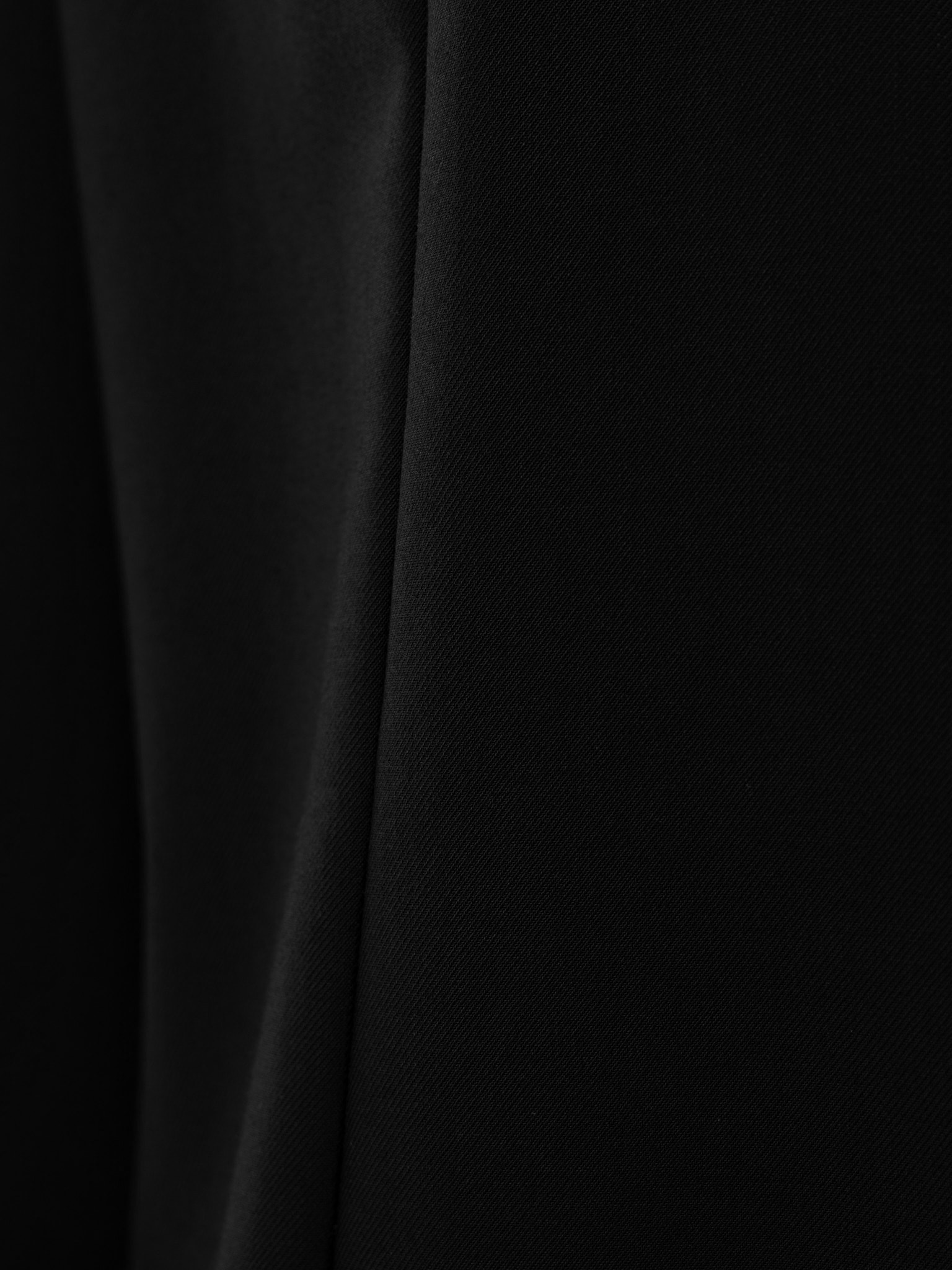 Complex cut shirt with hidden button fastening