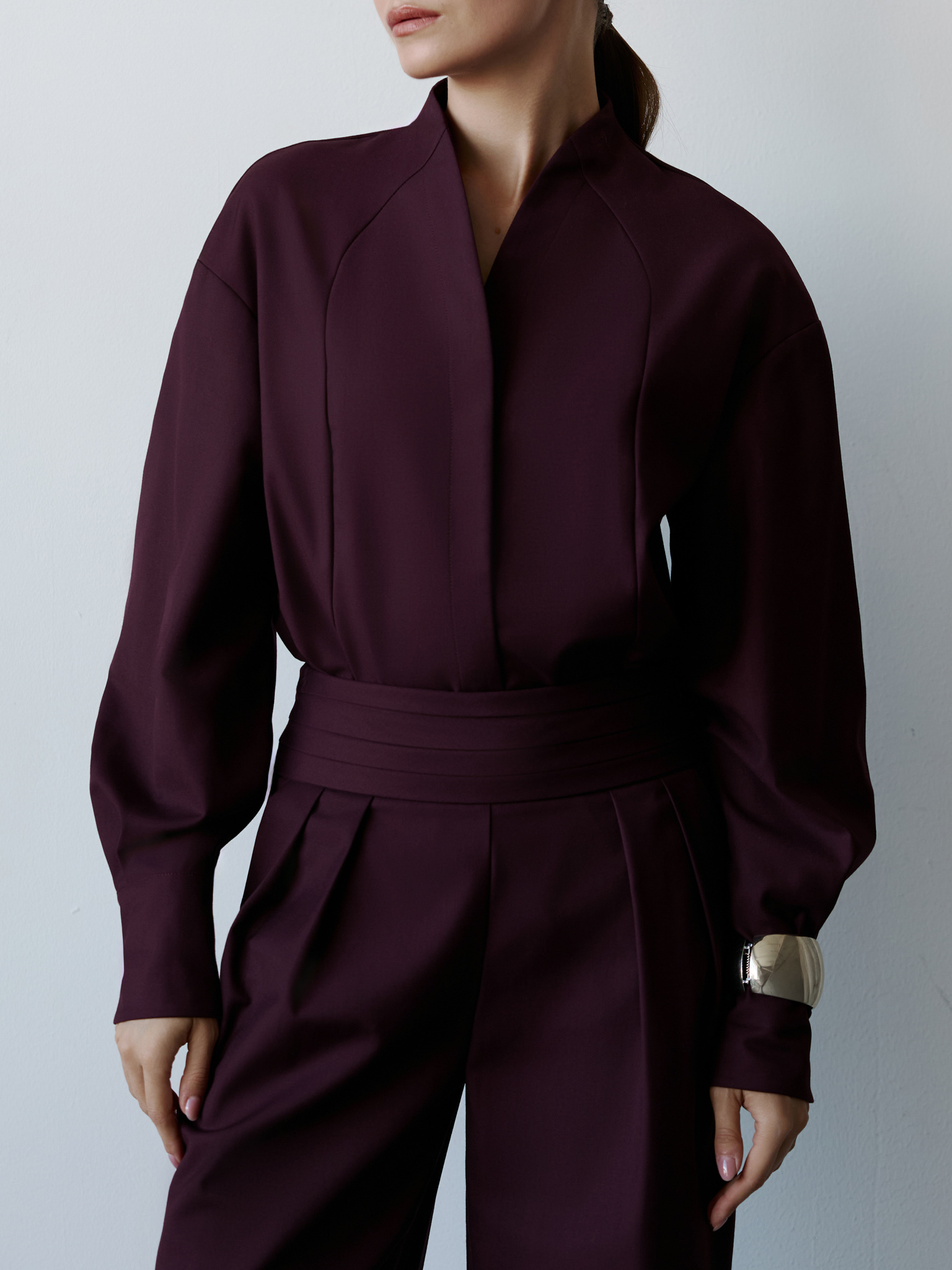 Complex cut shirt with hidden button fastening