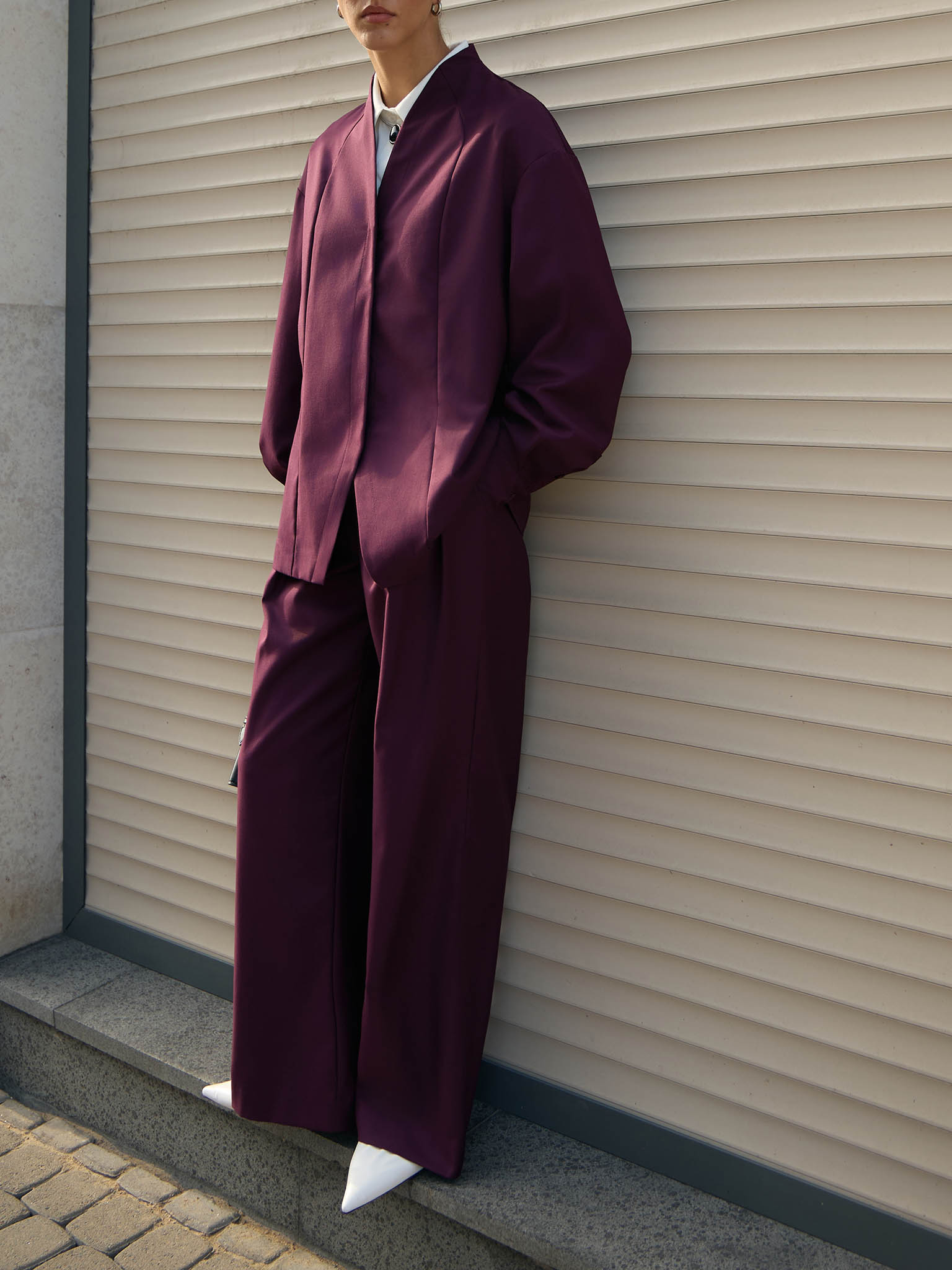 Complex cut shirt with hidden button fastening