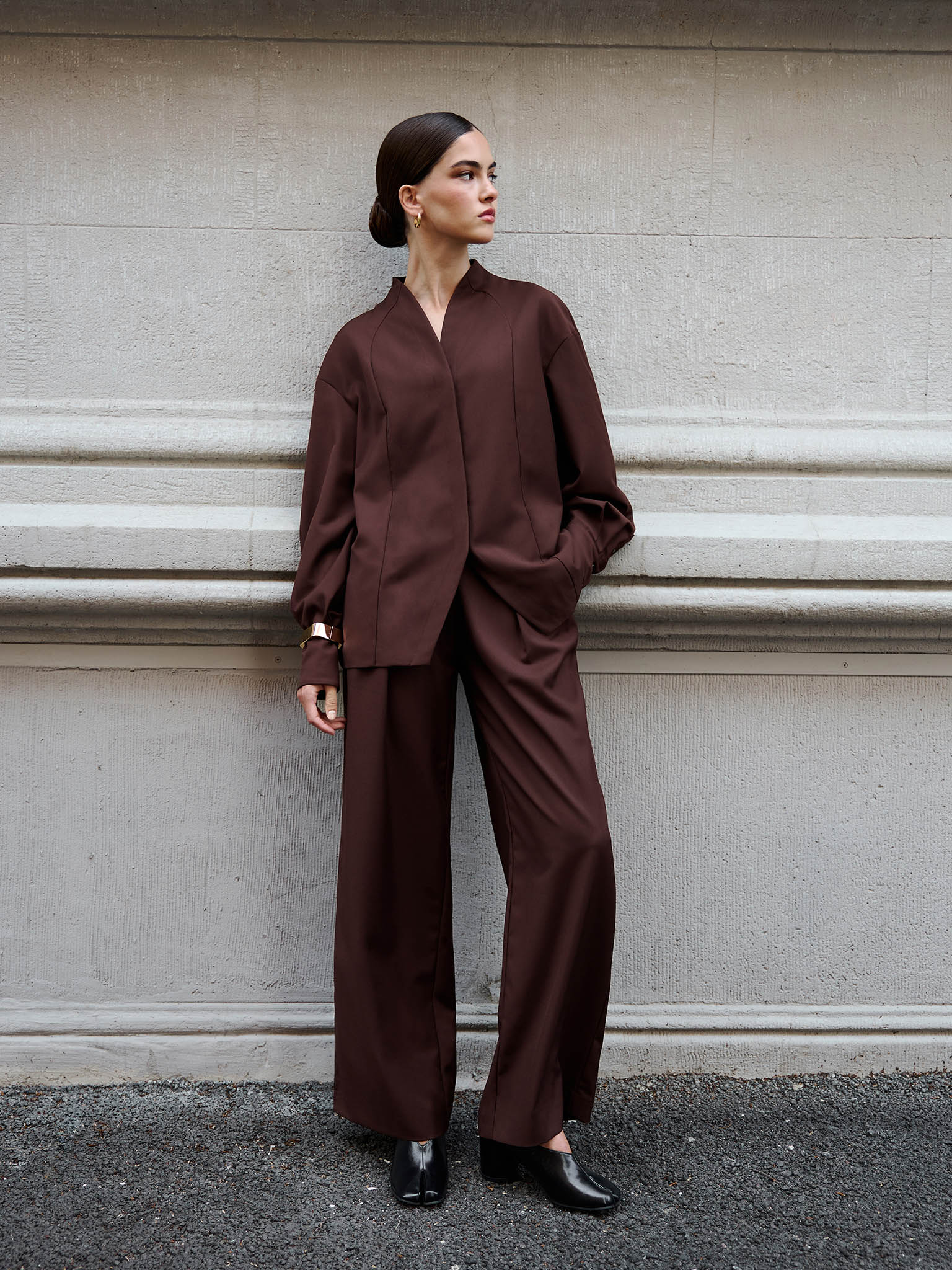 Complex cut shirt with hidden button fastening