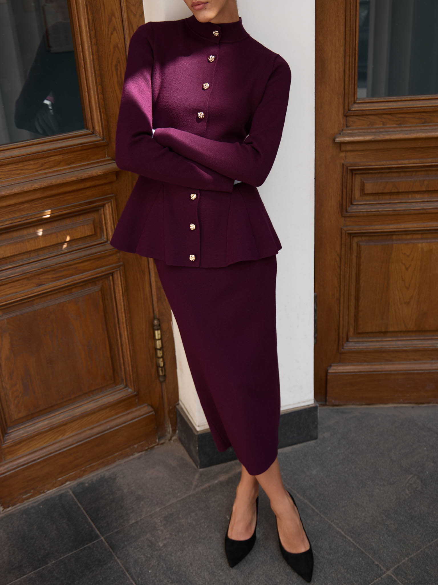 Jersey jacket with stand-up collar and golden buttons