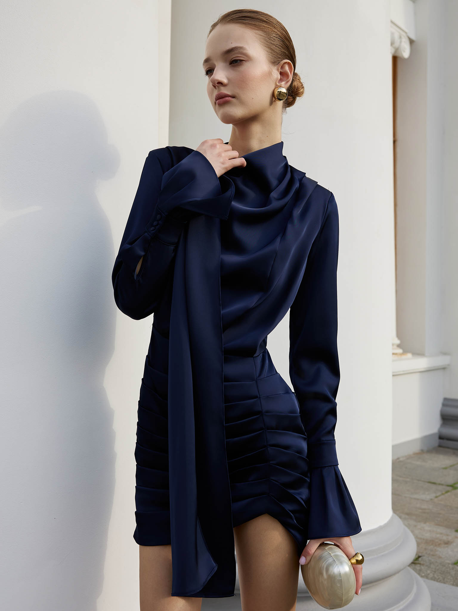 Flowing mini dress with a decorative scarf