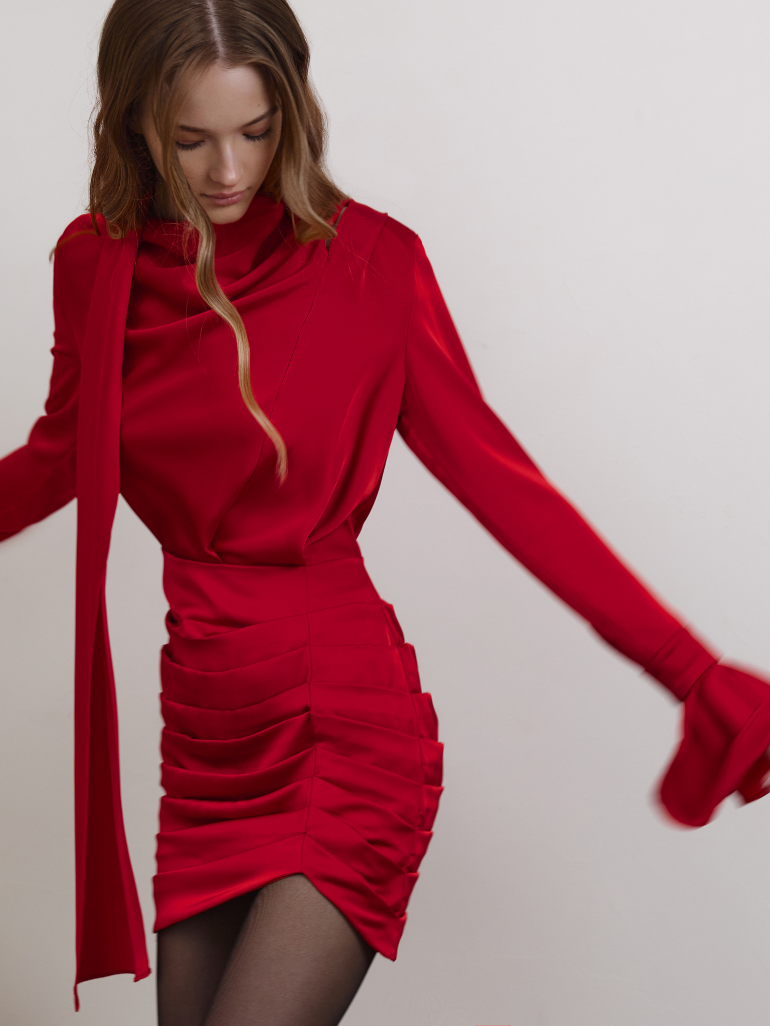 Flowing mini dress with a decorative scarf