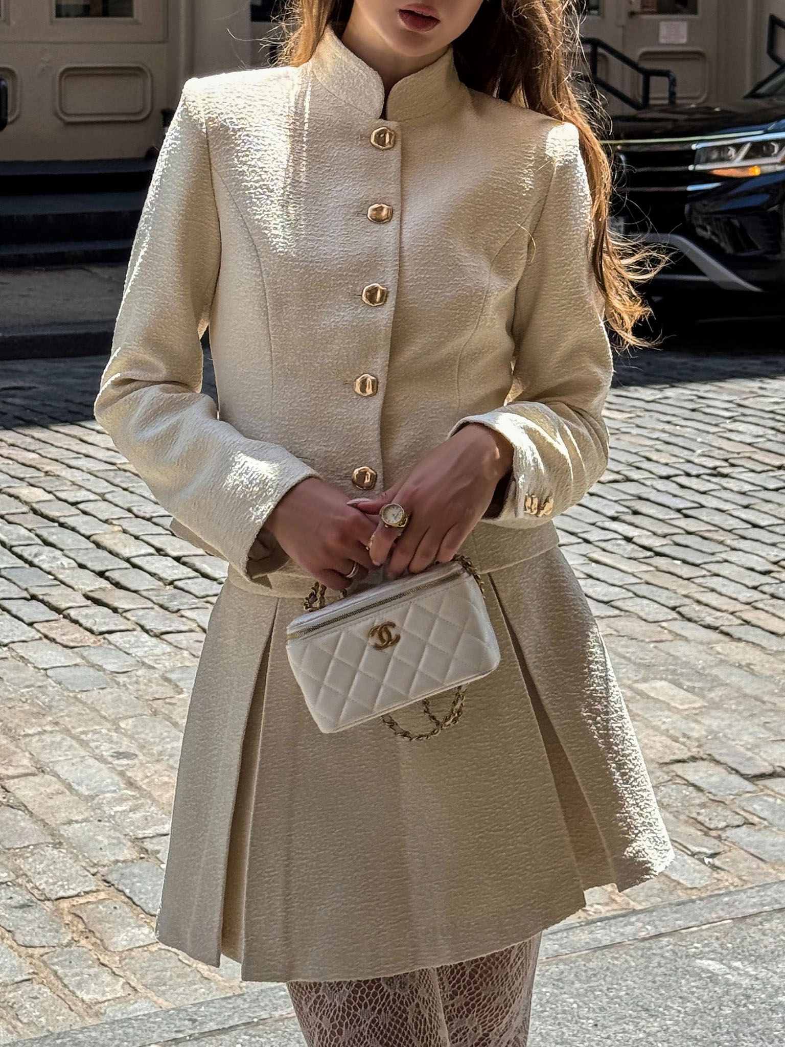 Straight jacket with stand-up collar and large buttons