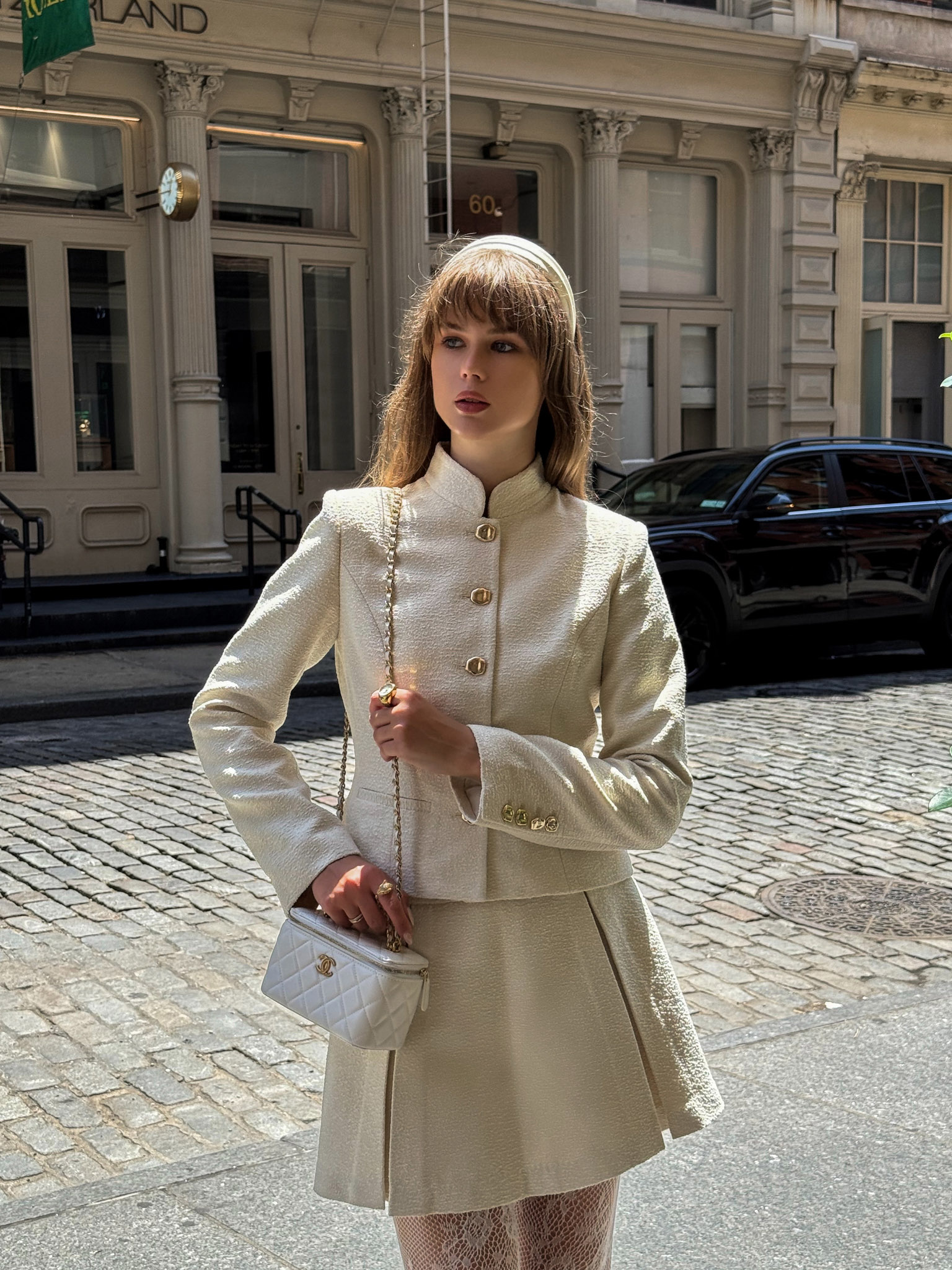 Straight jacket with stand-up collar and large buttons