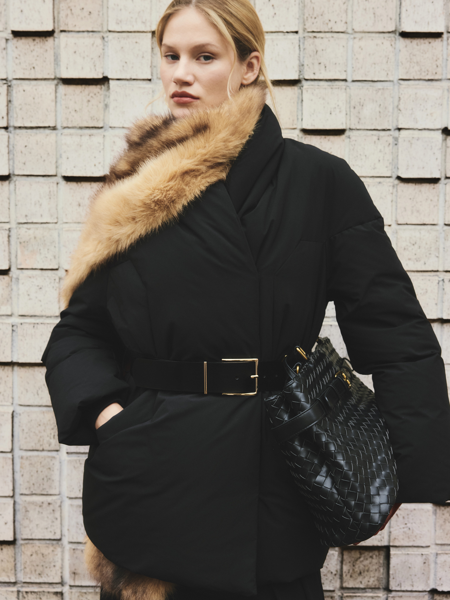 Down jacket with high collar and eco leather belt