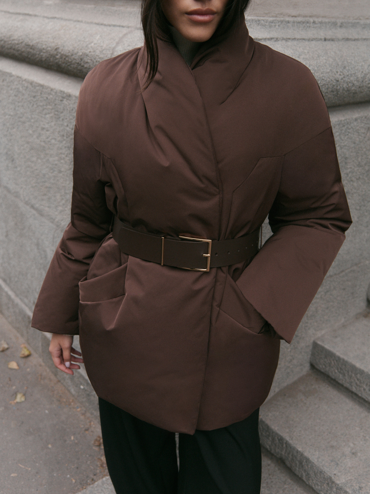 Down jacket with high collar and eco leather belt