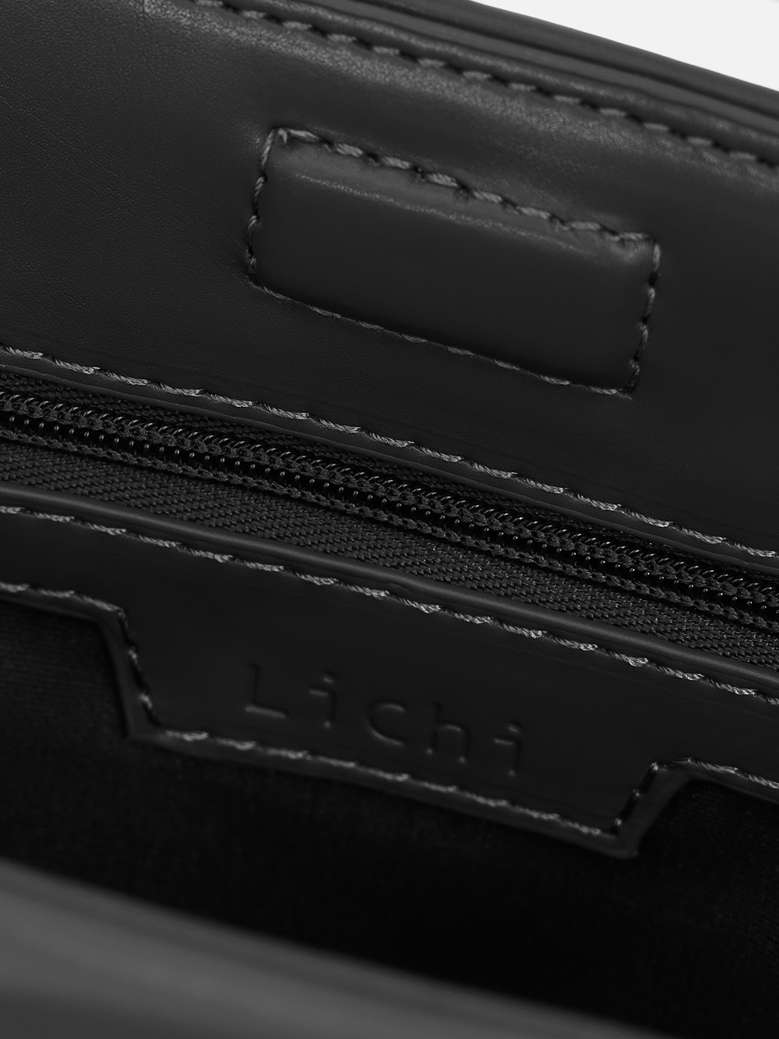 Eco-leather clutch with decorative pleats