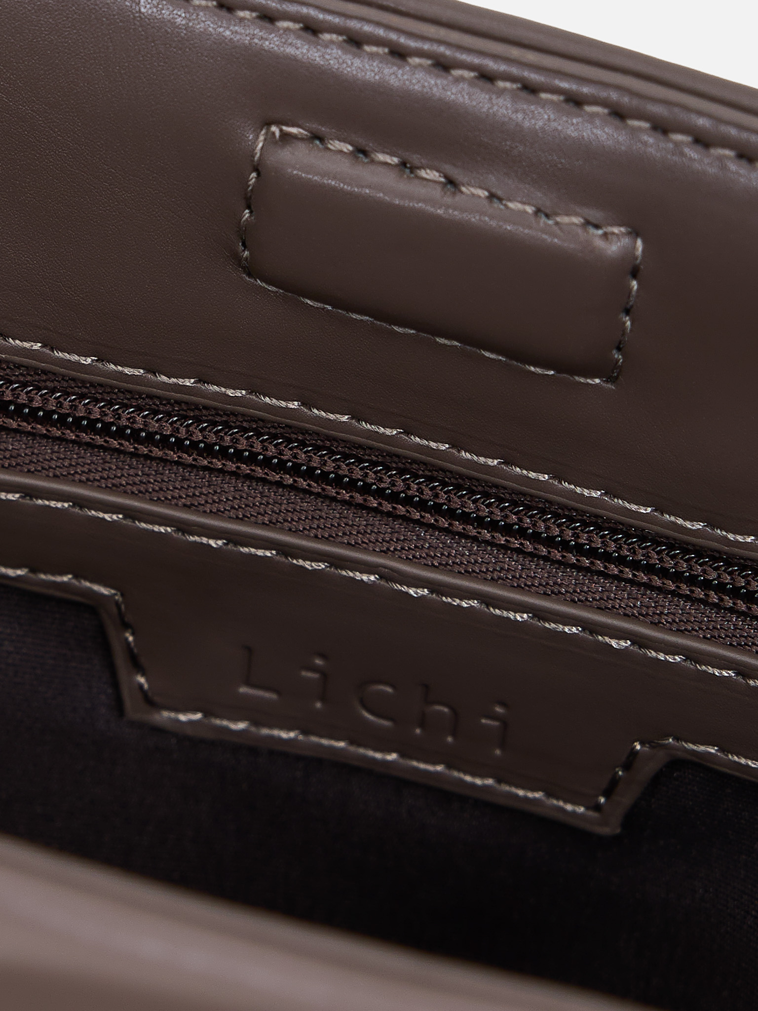 Eco-leather clutch with decorative pleats