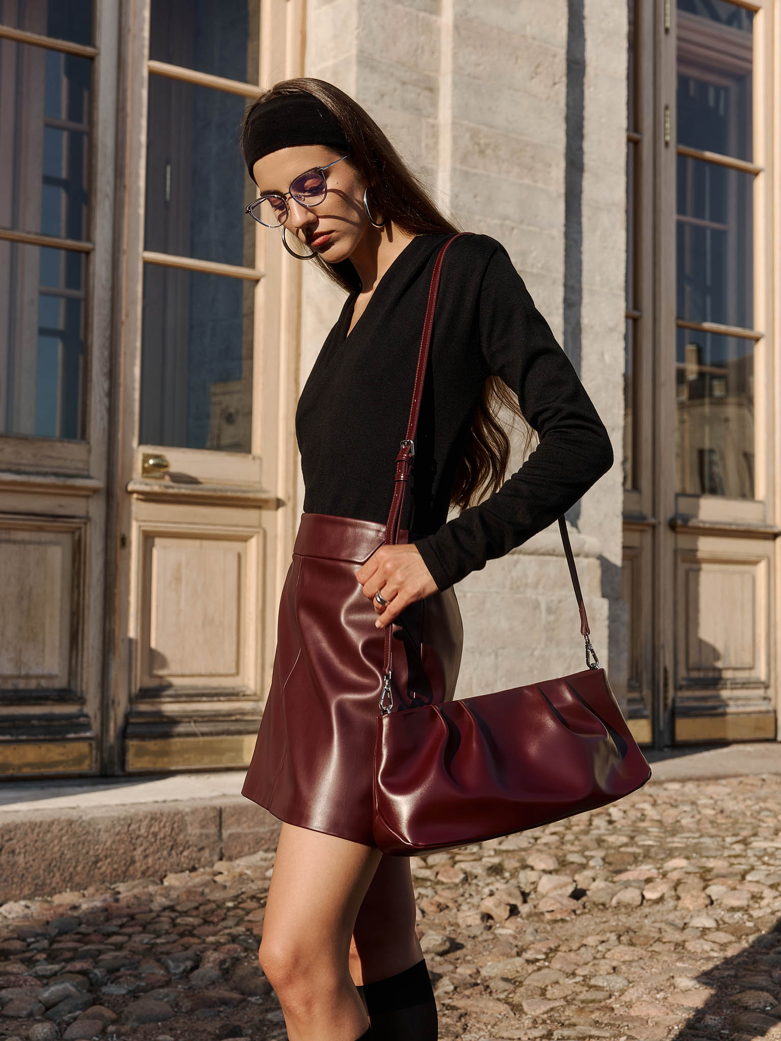 Eco-leather clutch with decorative pleats