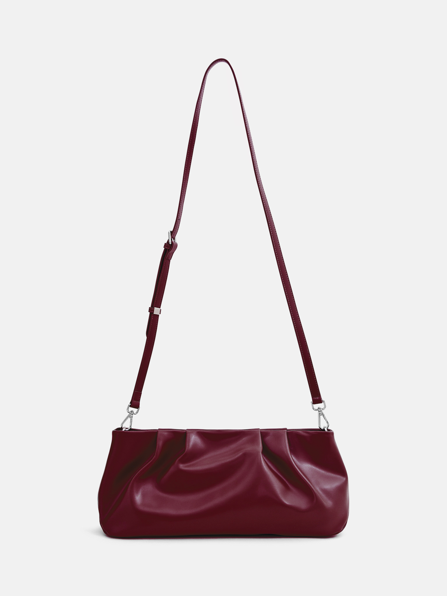 Eco-leather clutch with decorative pleats