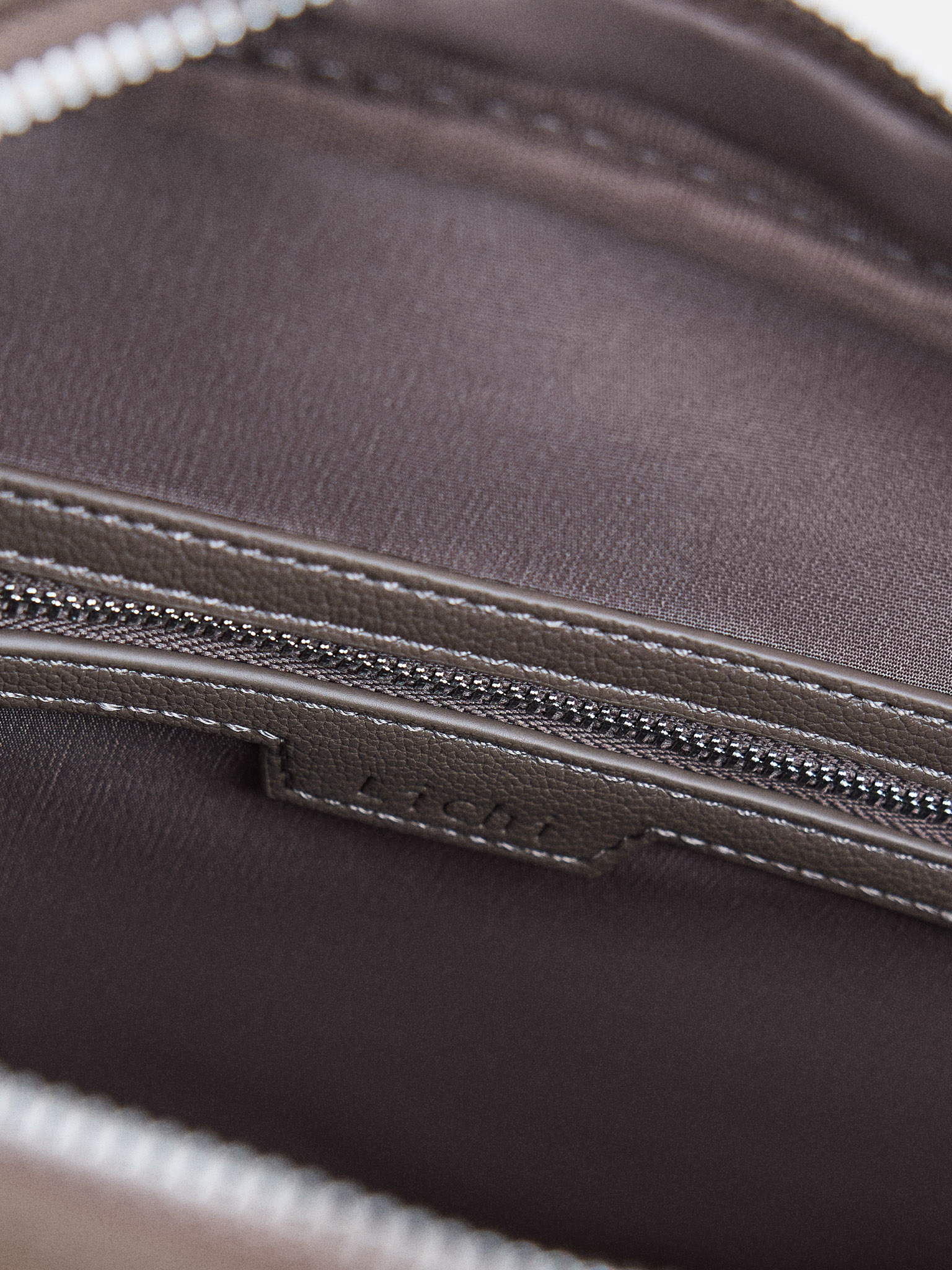 Eco-leather bag with long handles and zip fastening