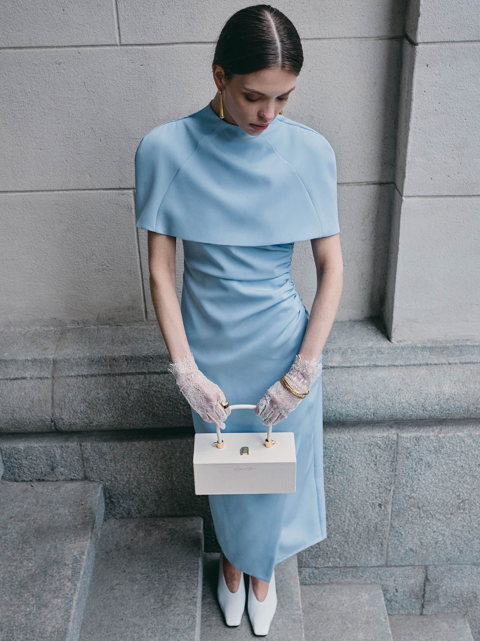 Fitted midi dress with a shoulder cape