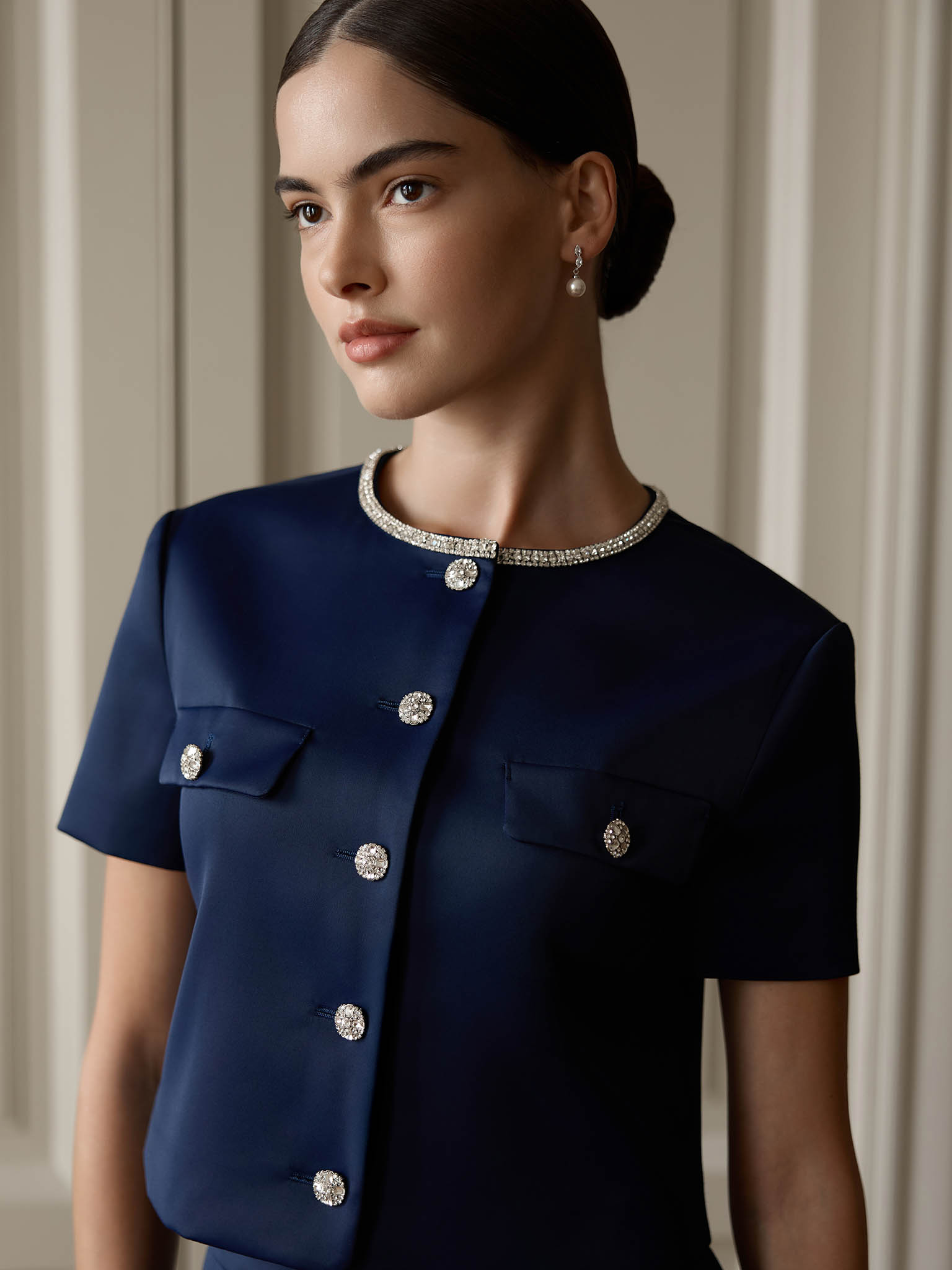 Short sleeved jacket with rhinestone buttons
