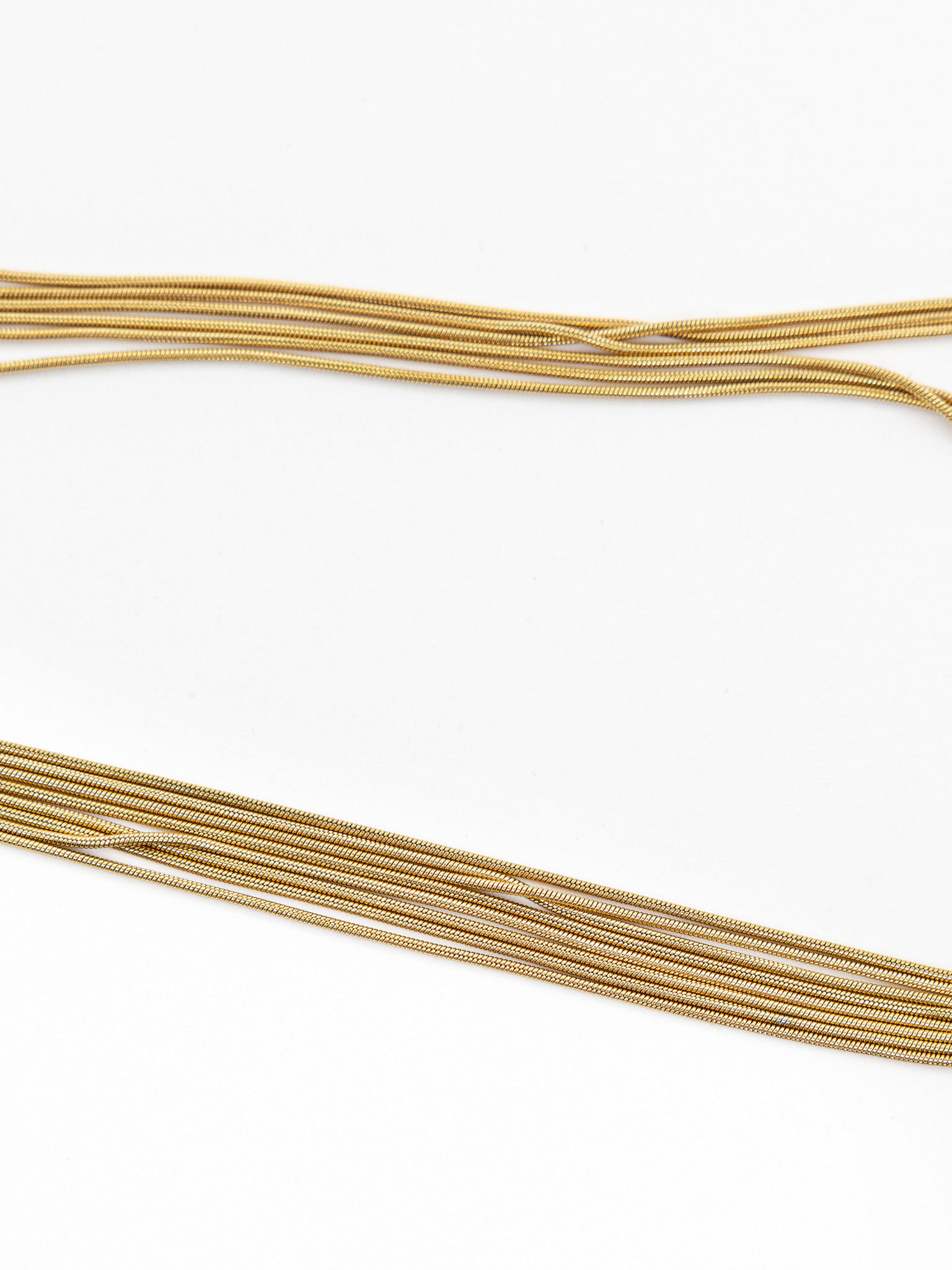 Многоуровневое колье из тонких цепей