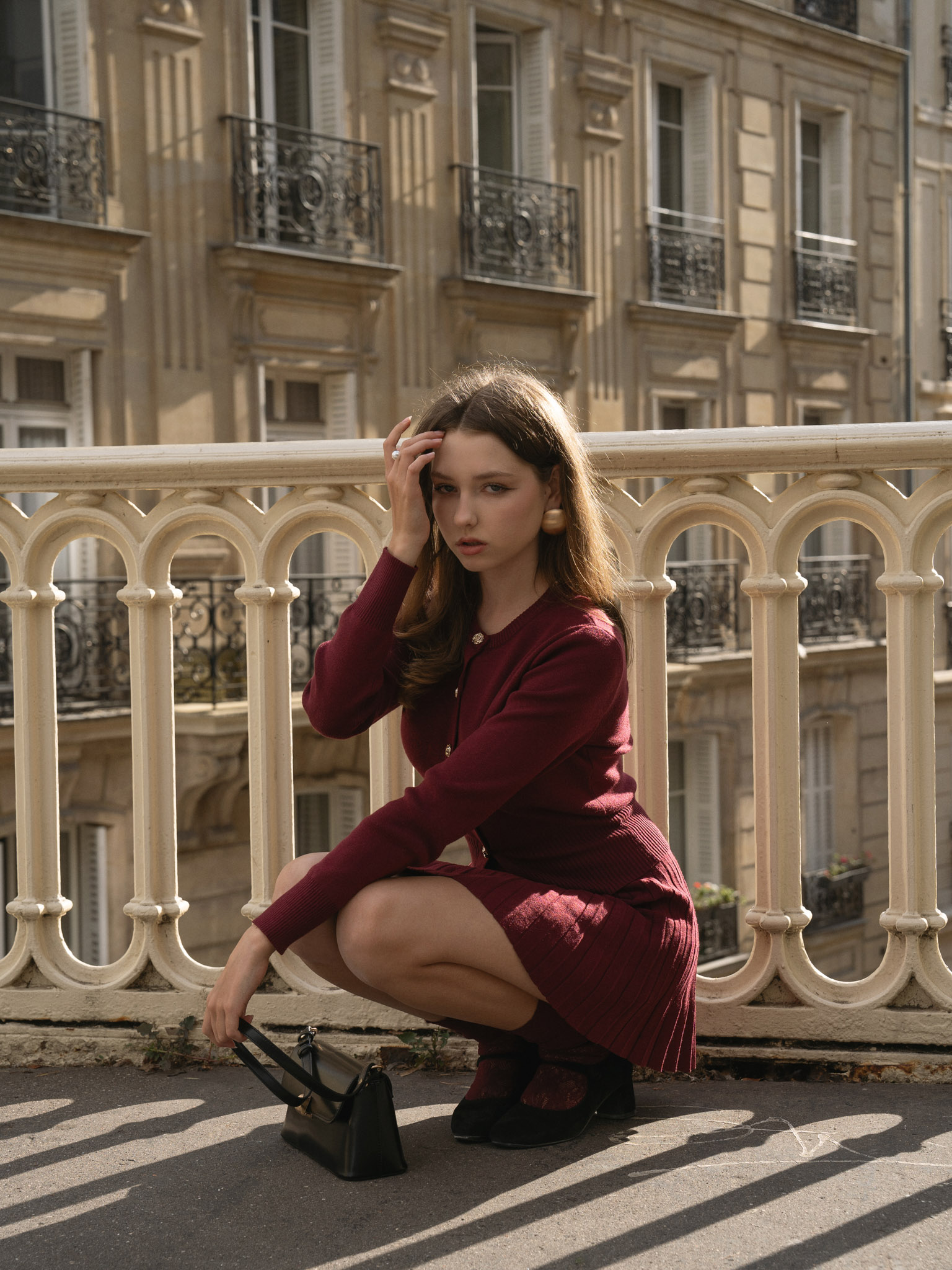 Knitted cardigan with golden buttons