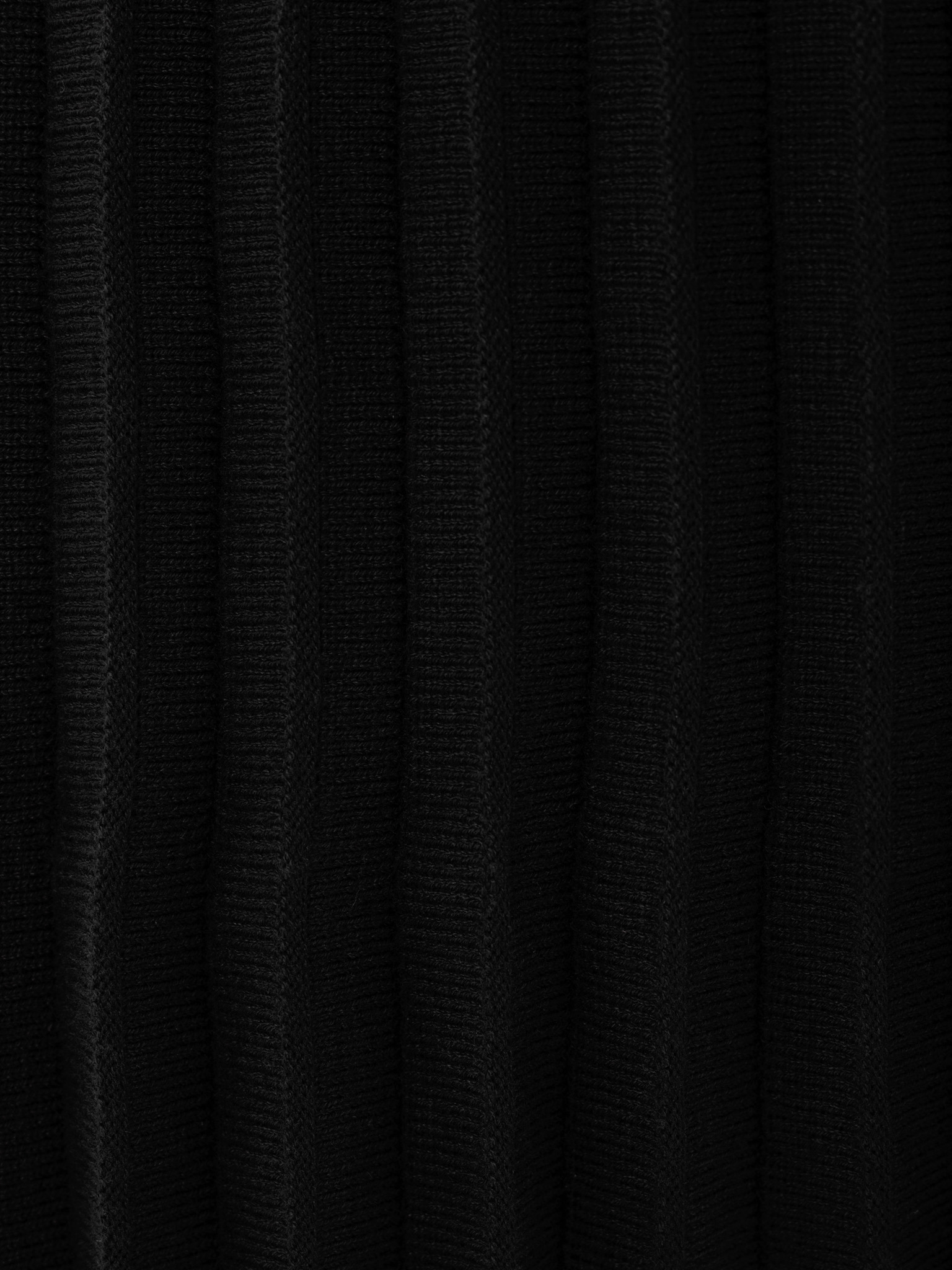 Pleated knitted mini skirt