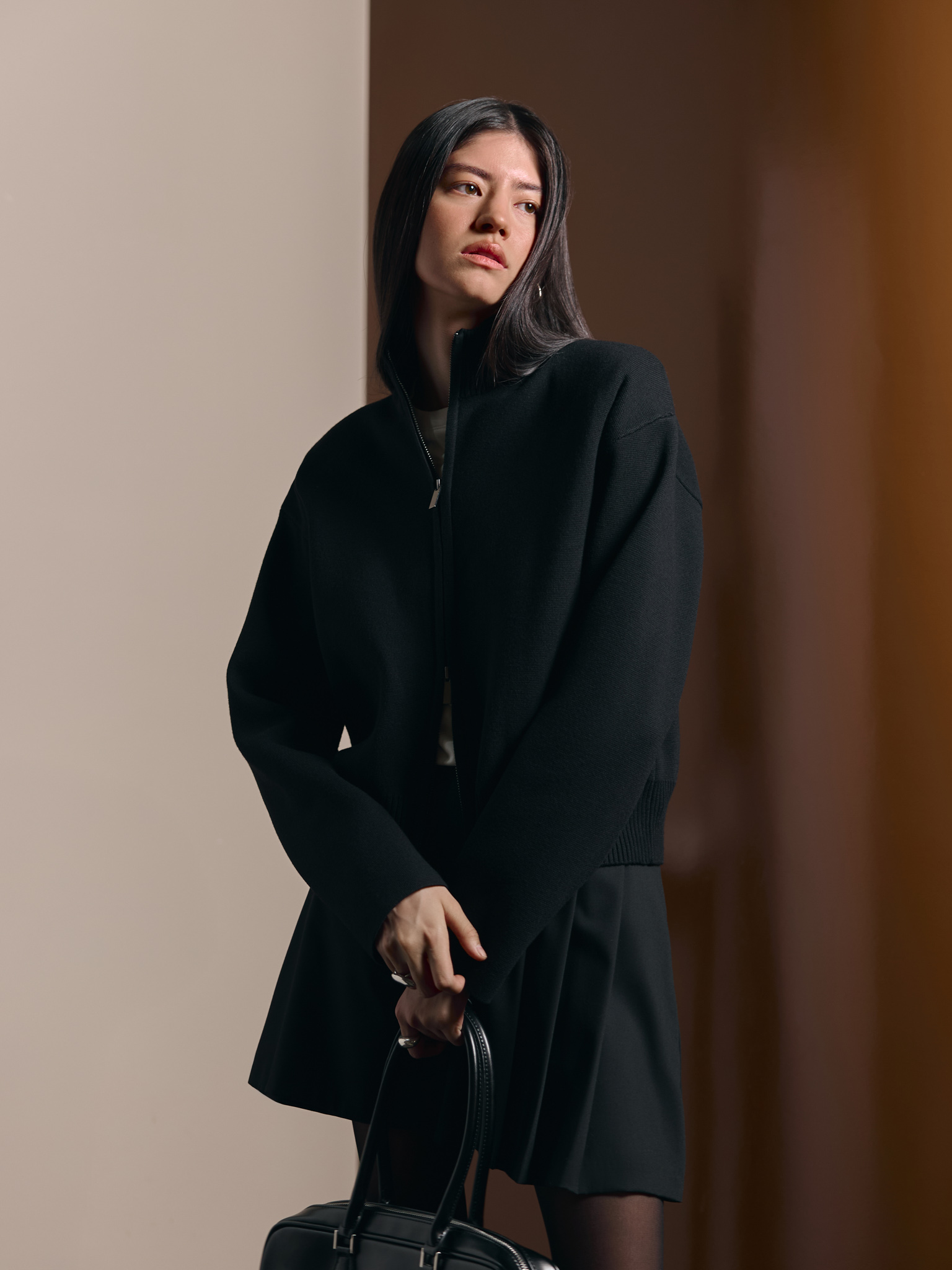 Loose cardigan with zip fastening