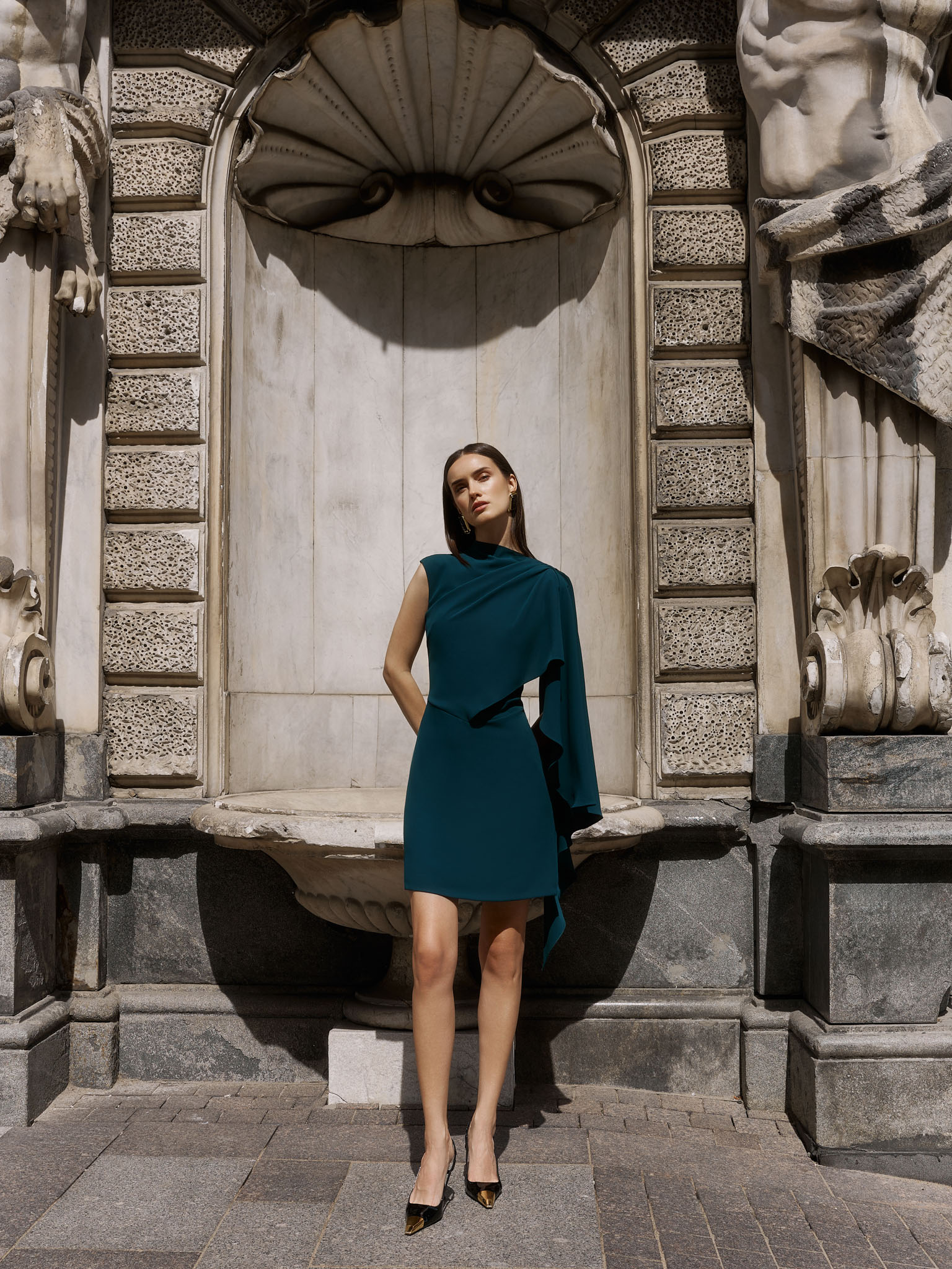 Fitted mini dress with asymmetric draping