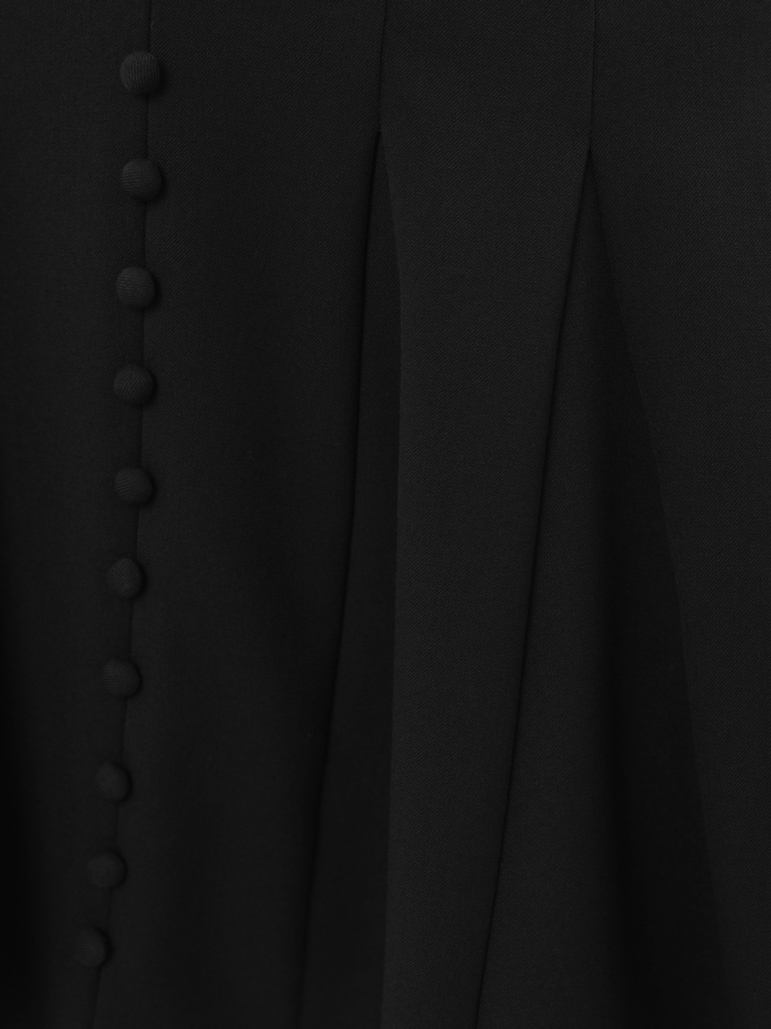 Fitted mini dress with shaped neckline and small buttons