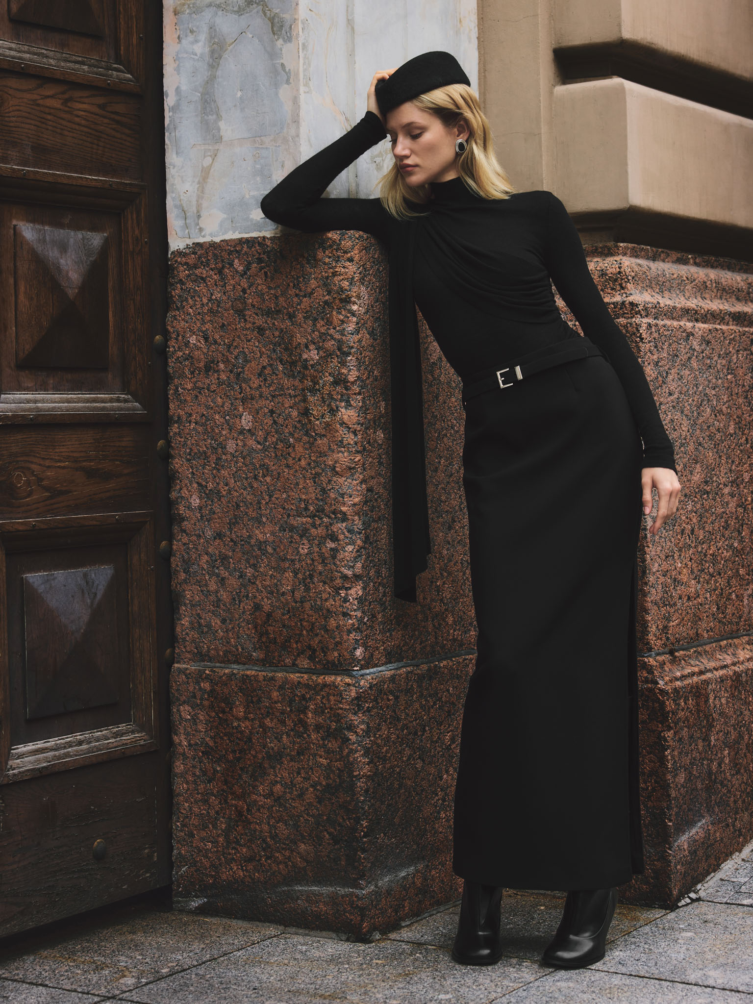 Turtleneck with diagonal drapery on the shoulder