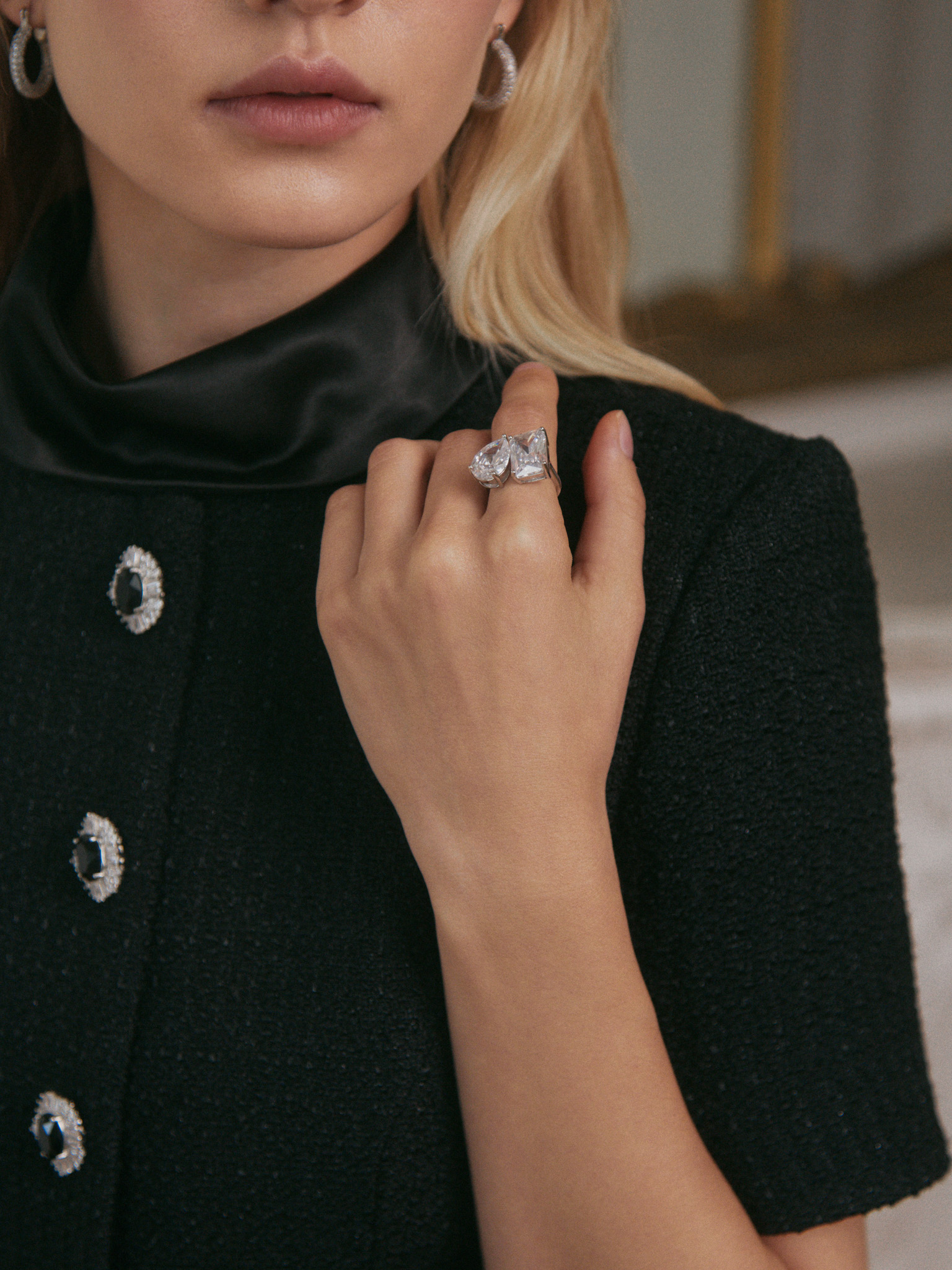 Silvertone ring with two crystals