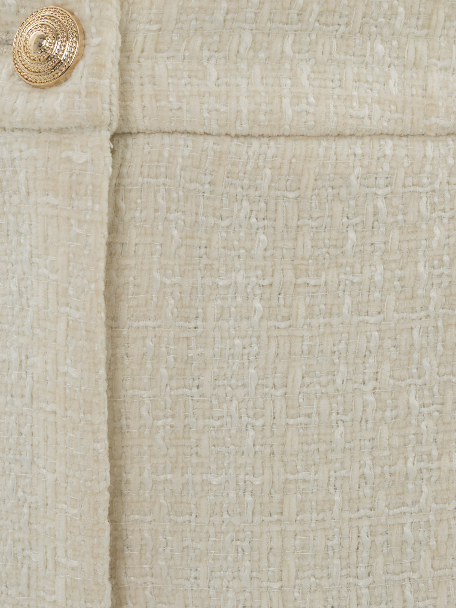 Tweed mini shorts with golden fittings