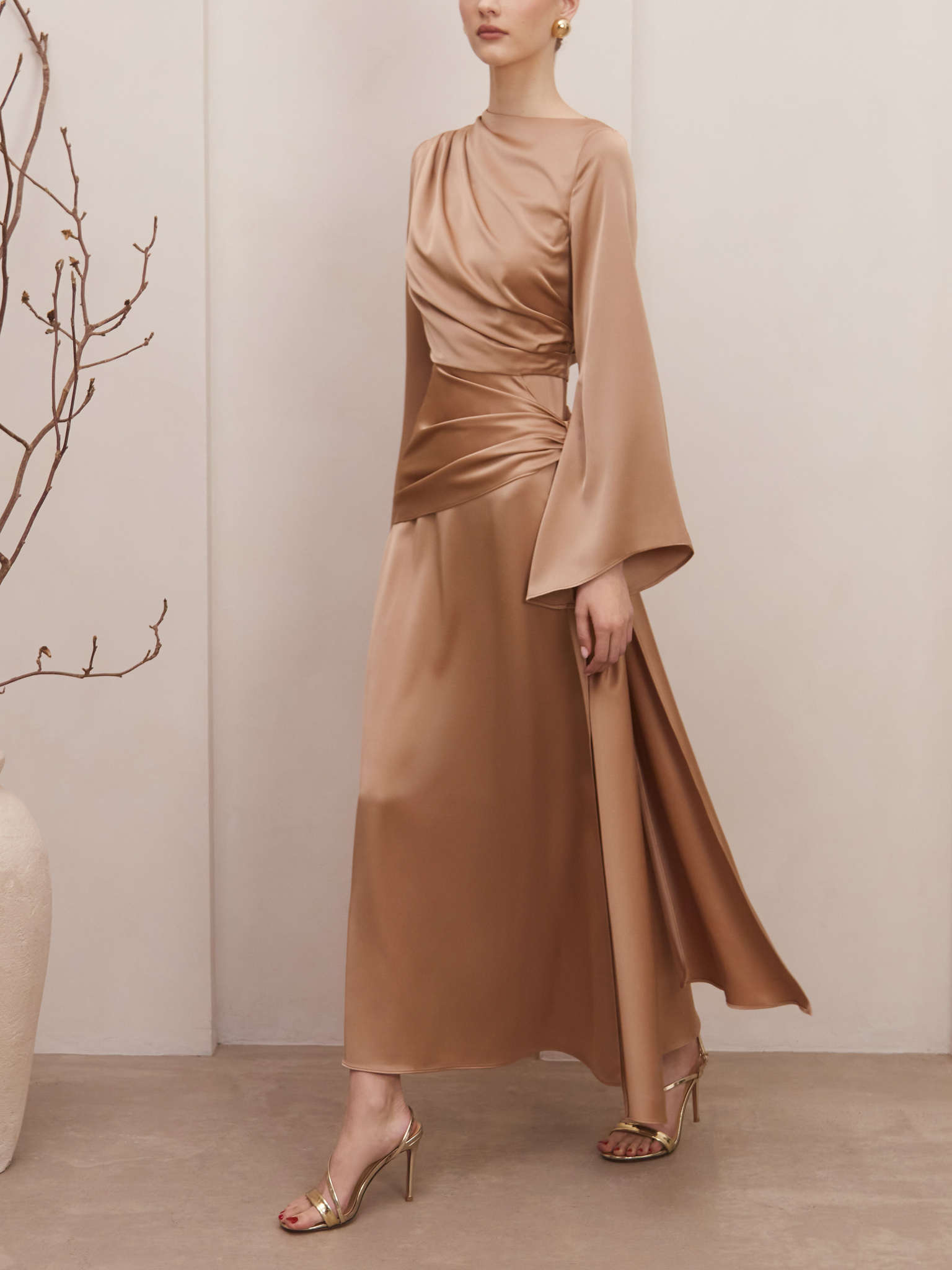 Maxi satin dress with long sleeves and asymmetrical draping