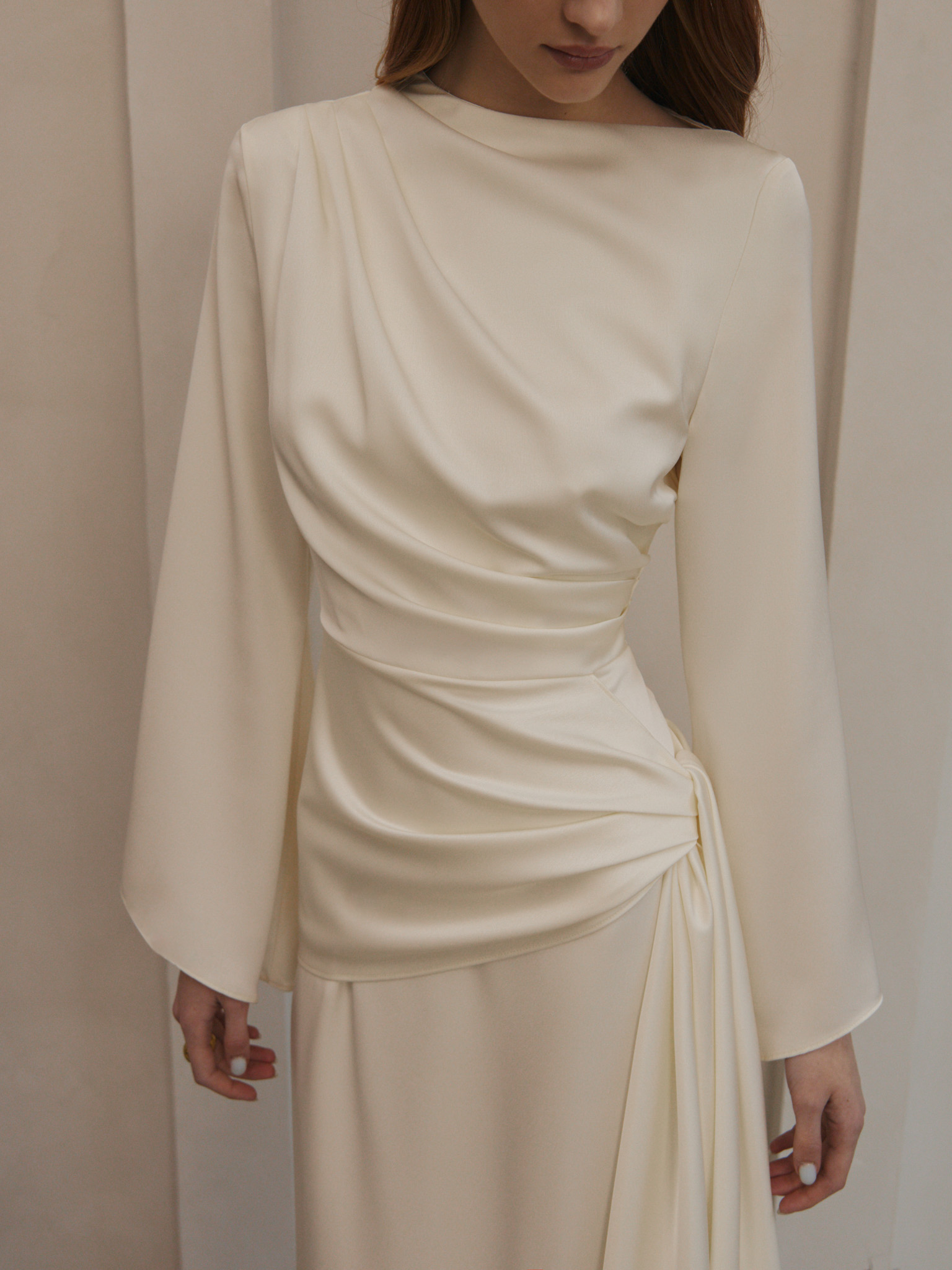 Maxi satin dress with long sleeves and asymmetrical draping