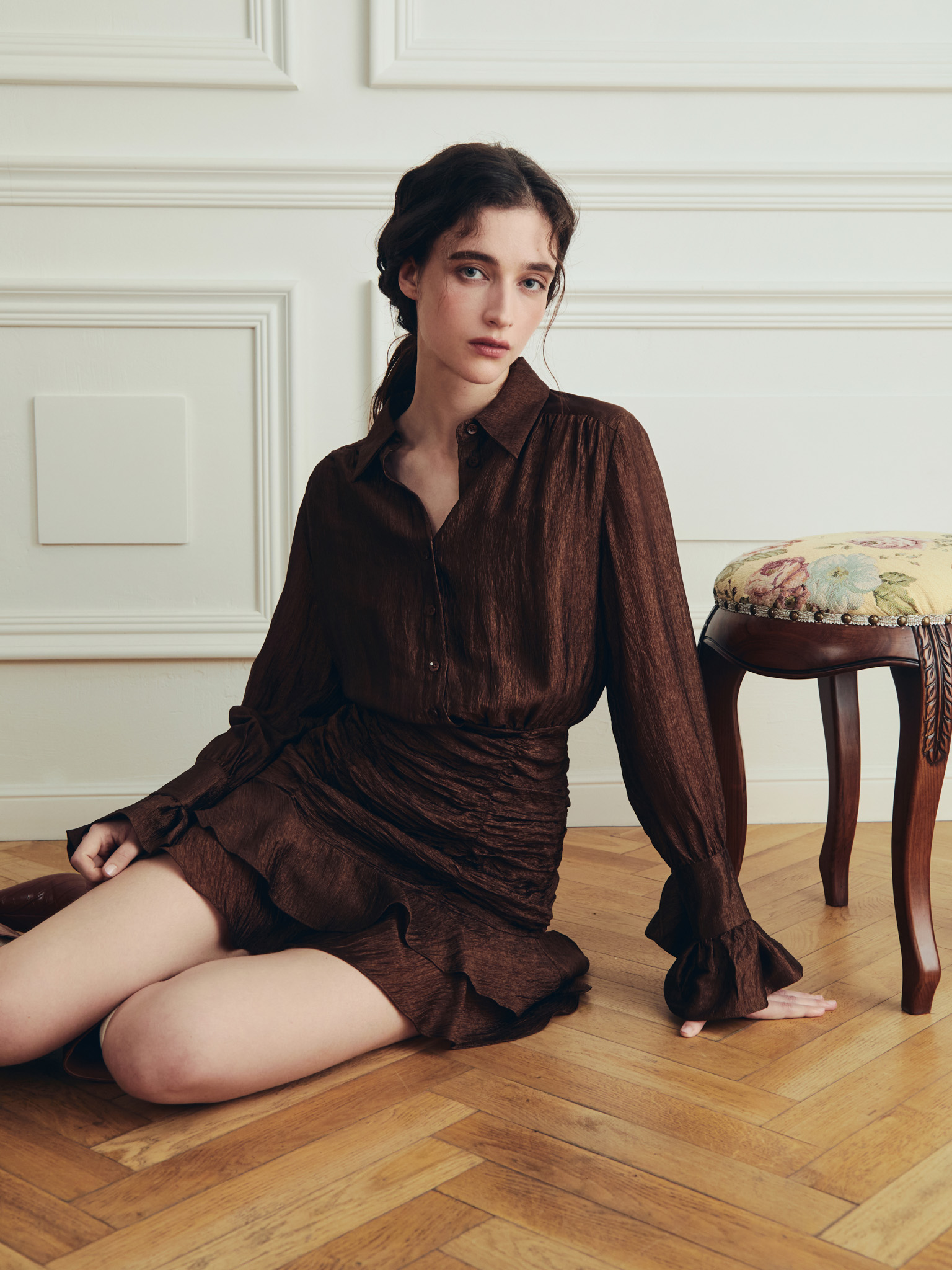Mini dress with gathered skirt and small matching buttons