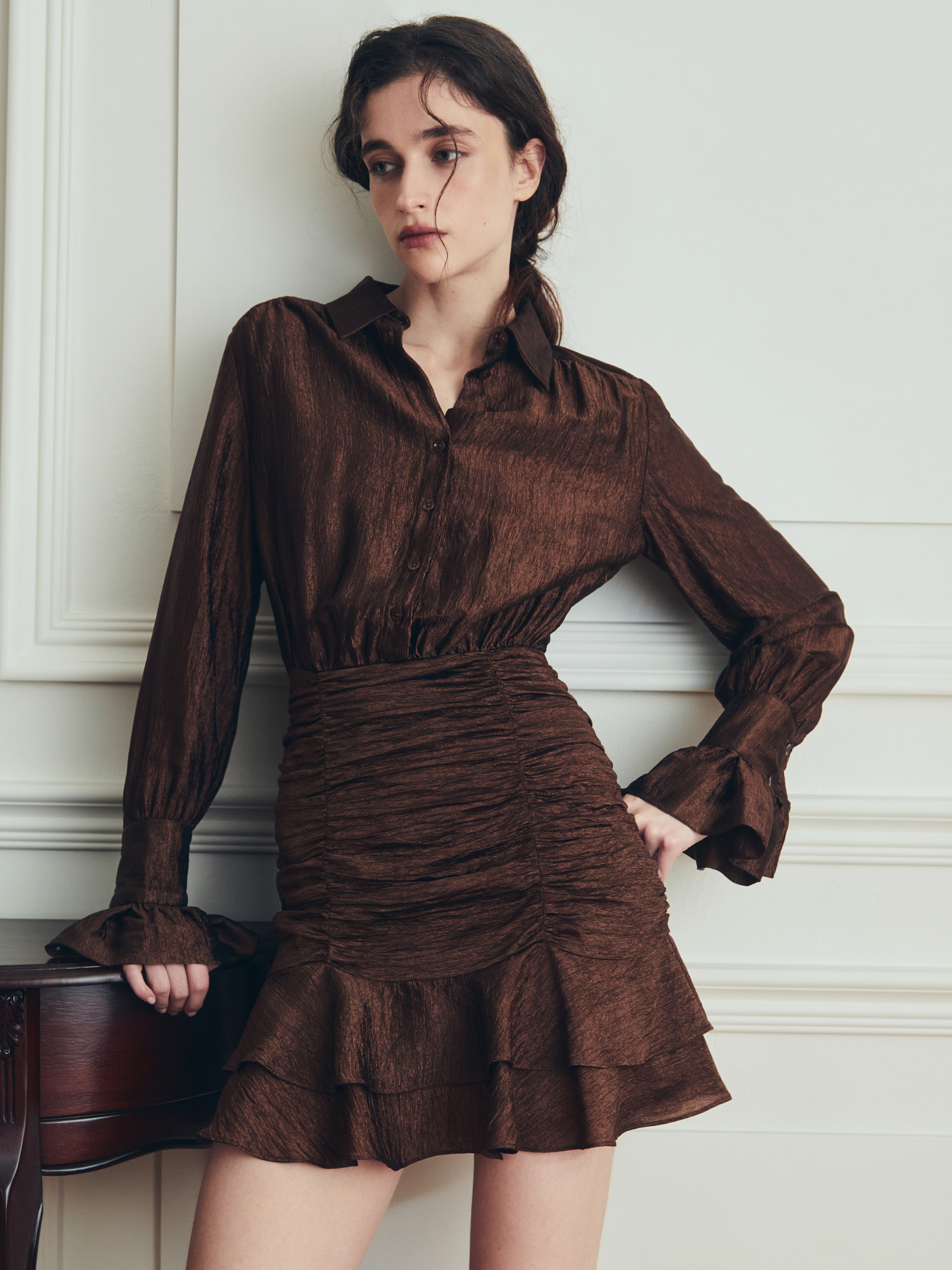 Mini dress with gathered skirt and small matching buttons