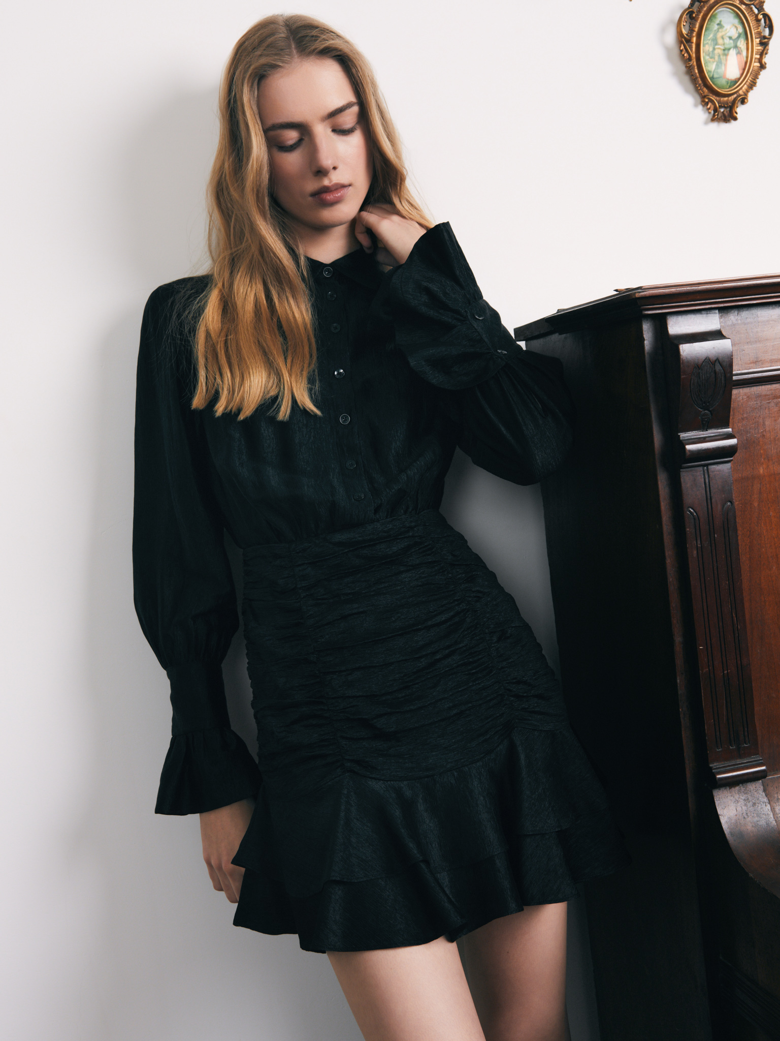 Mini dress with gathered skirt and small matching buttons