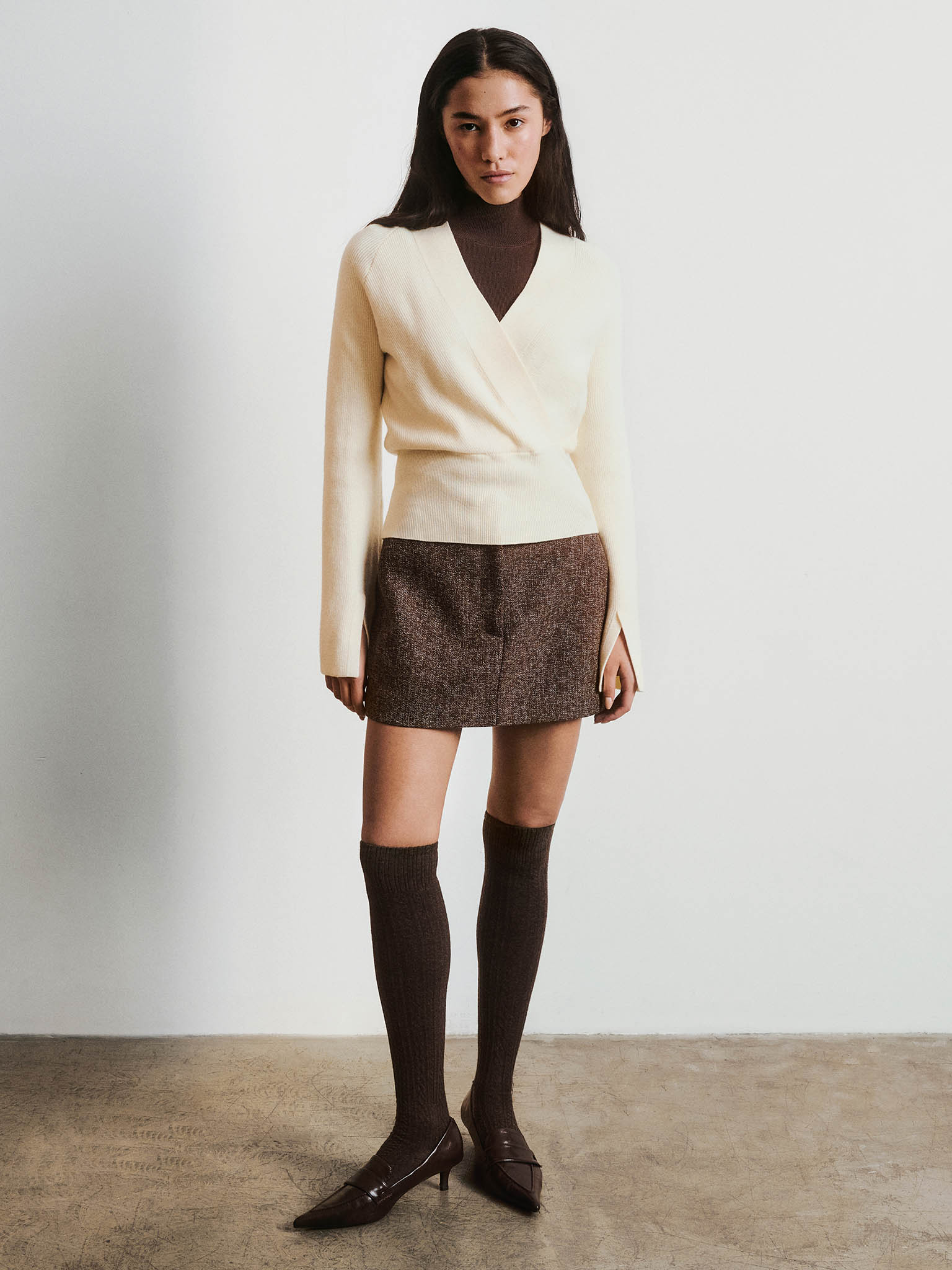 Knitted jumper with wrap imitation