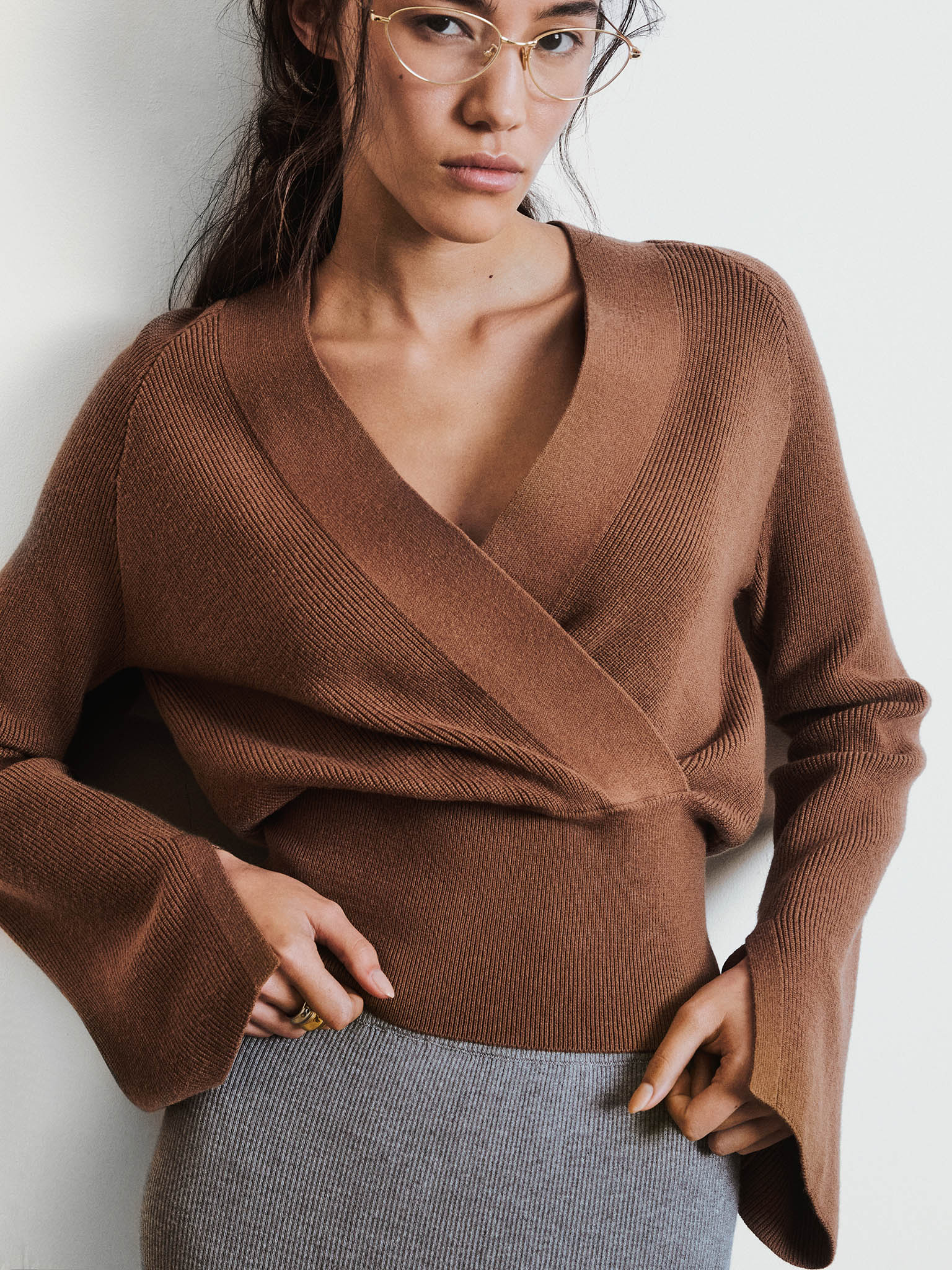 Knitted jumper with wrap imitation