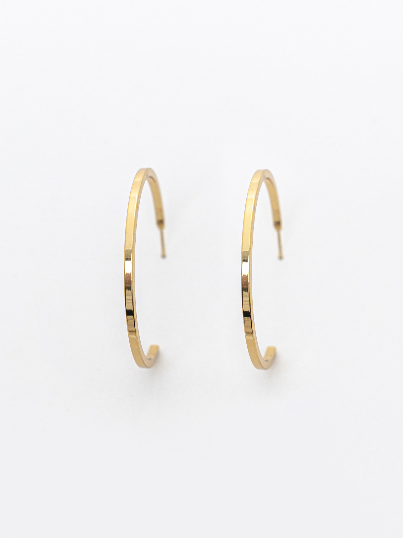 Тонкие серьги-полукольца