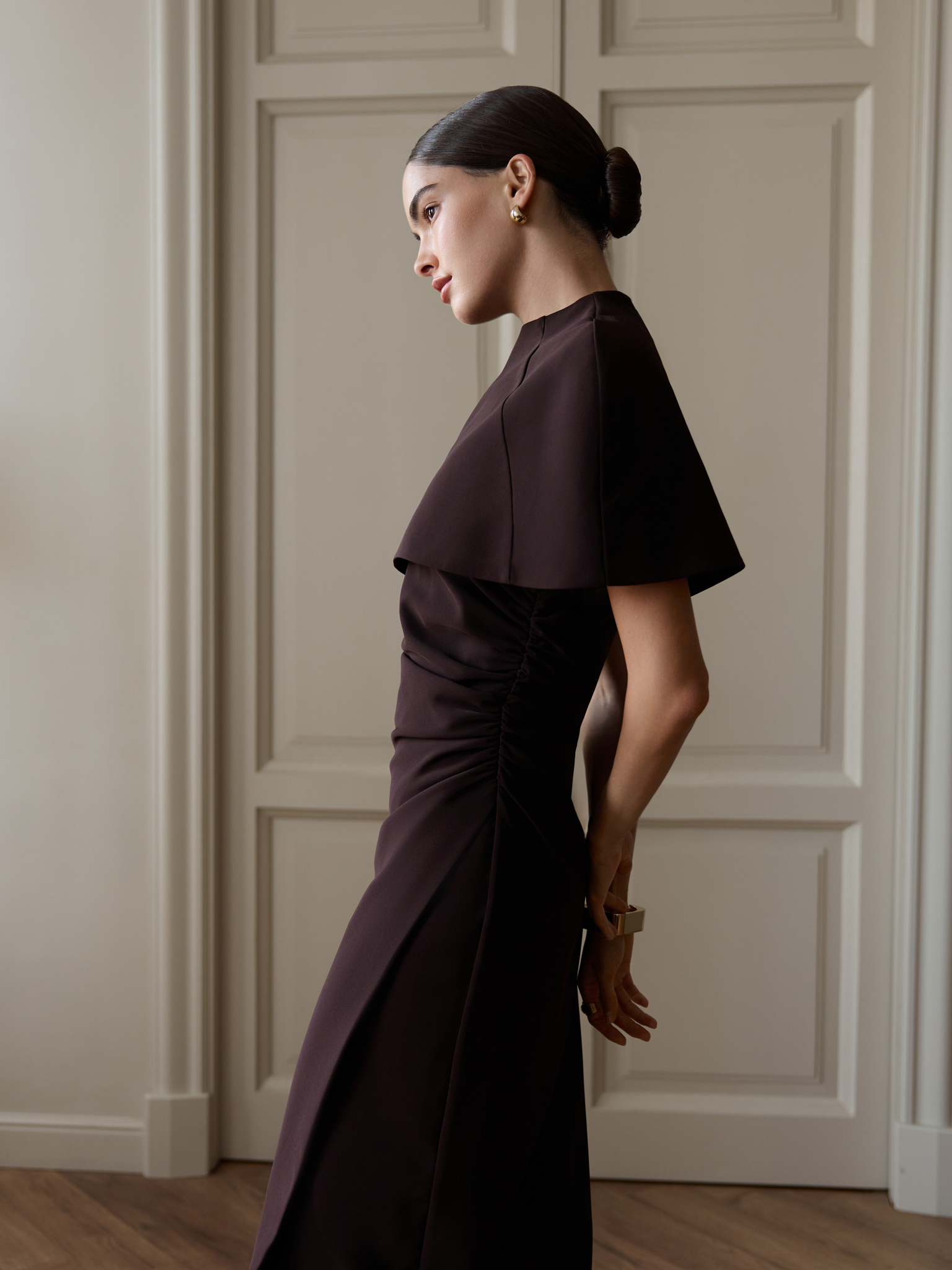 Fitted midi dress with a shoulder cape