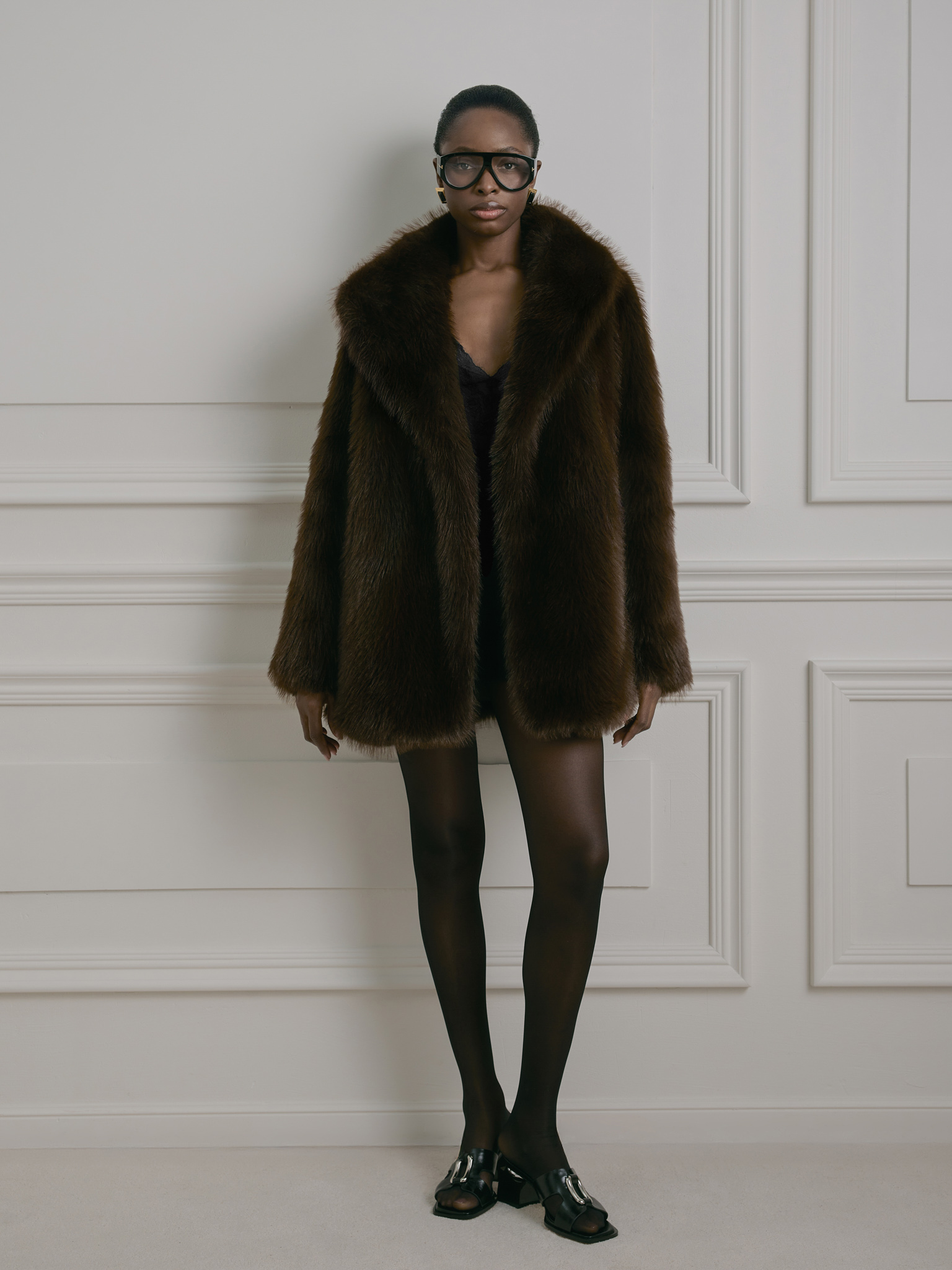 Short loose-fitting eco-fur coat with stand-up collar